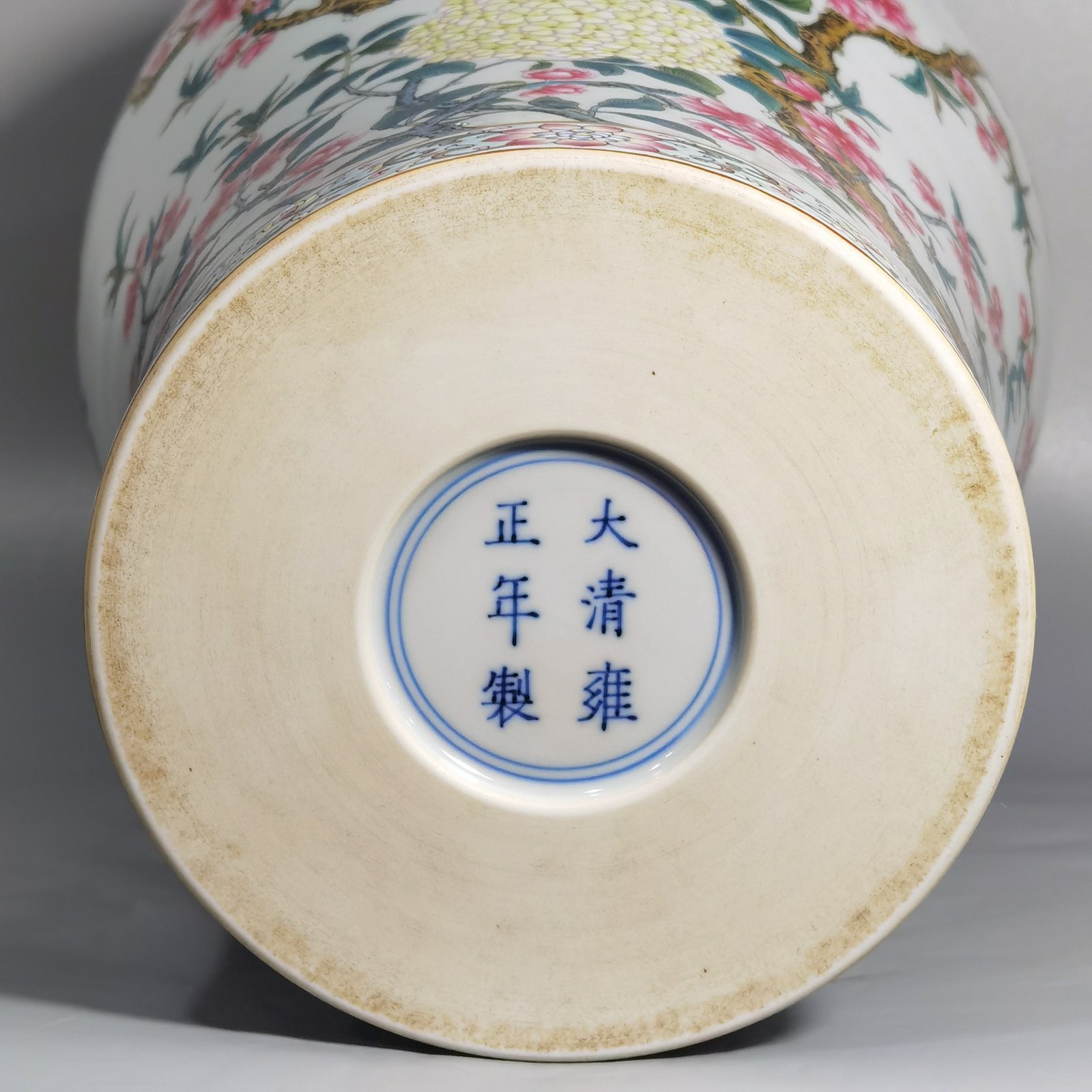 Qing Dynasty Yongzheng enamel plum vase with peach blossoms and magpie poems
