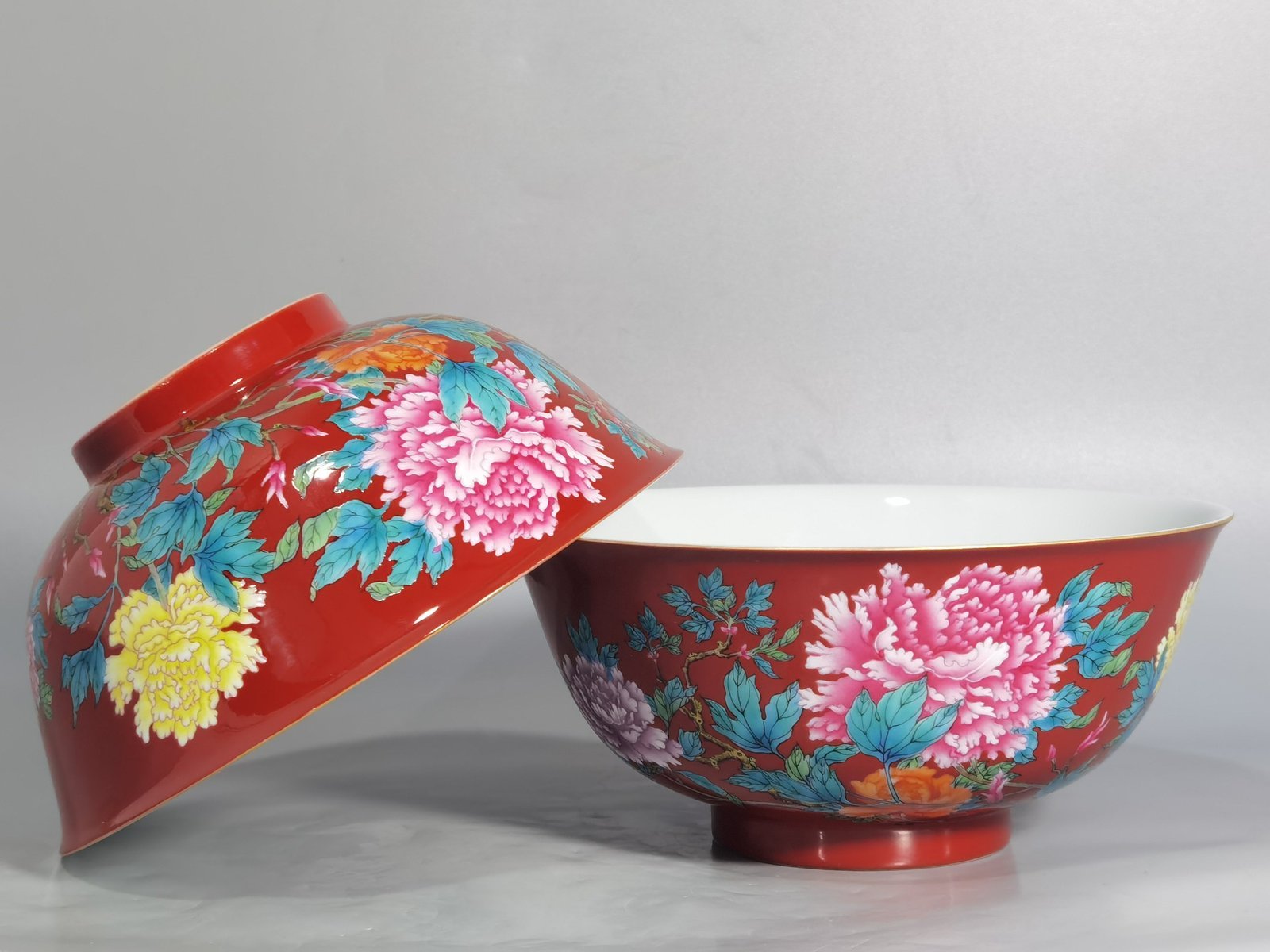 Qing Dynasty Yongzheng enamel coral red ground peony flower bowl
