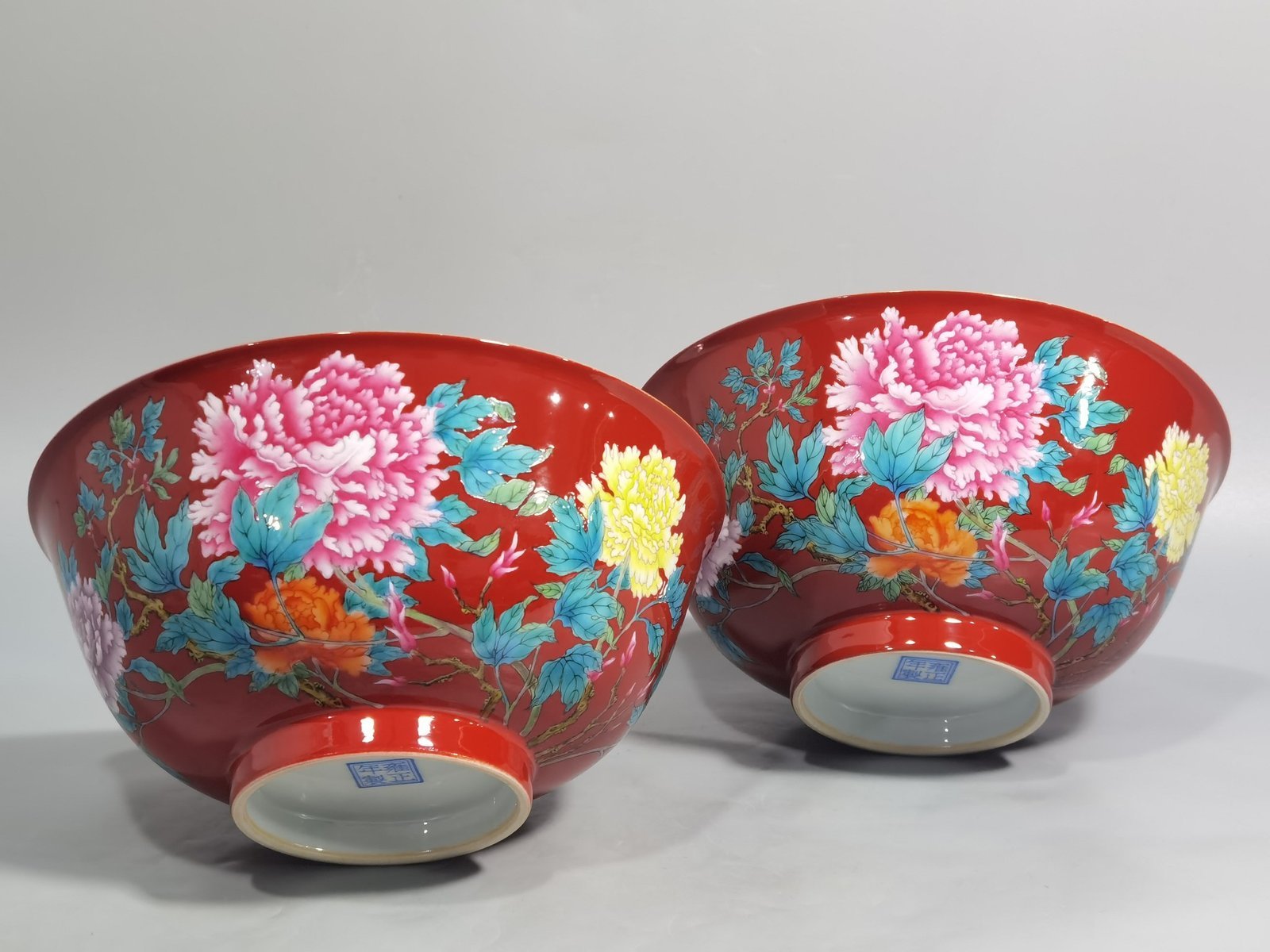 Qing Dynasty Yongzheng enamel coral red ground peony flower bowl