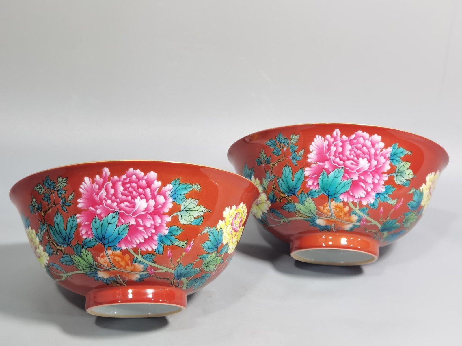 Qing Dynasty Yongzheng enamel coral red ground peony flower bowl