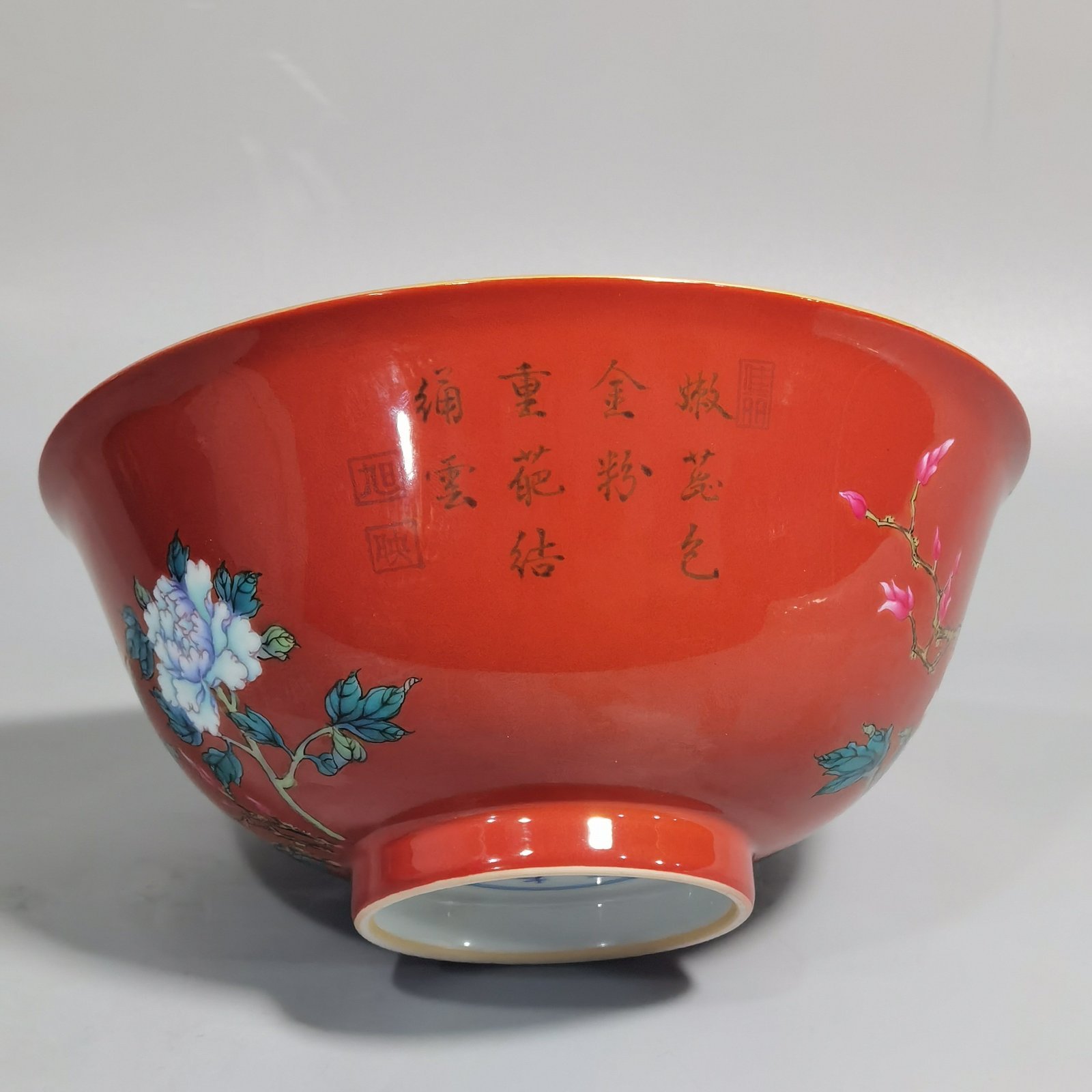 Qing Dynasty Yongzheng enamel coral red ground peony flower bowl