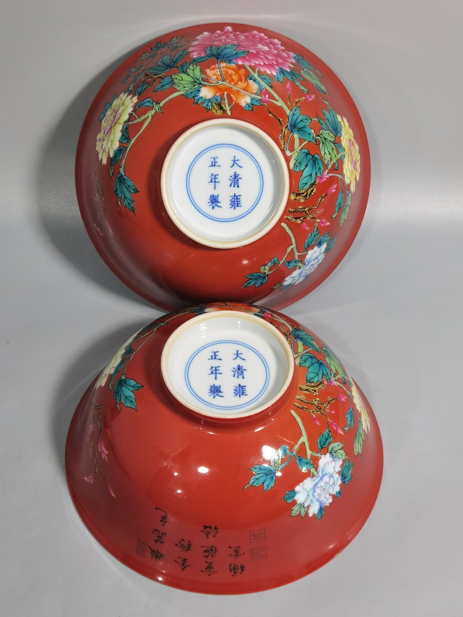 Qing Dynasty Yongzheng enamel coral red ground peony flower bowl