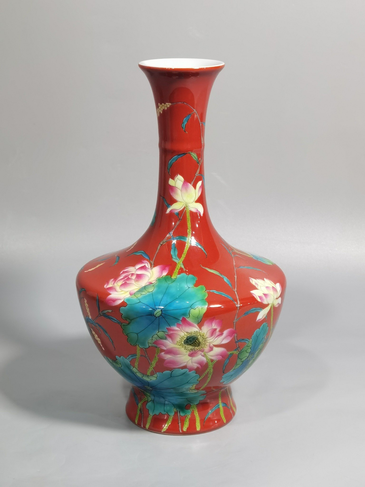 Qing Dynasty Yongzheng enamel coral red ground lotus vase