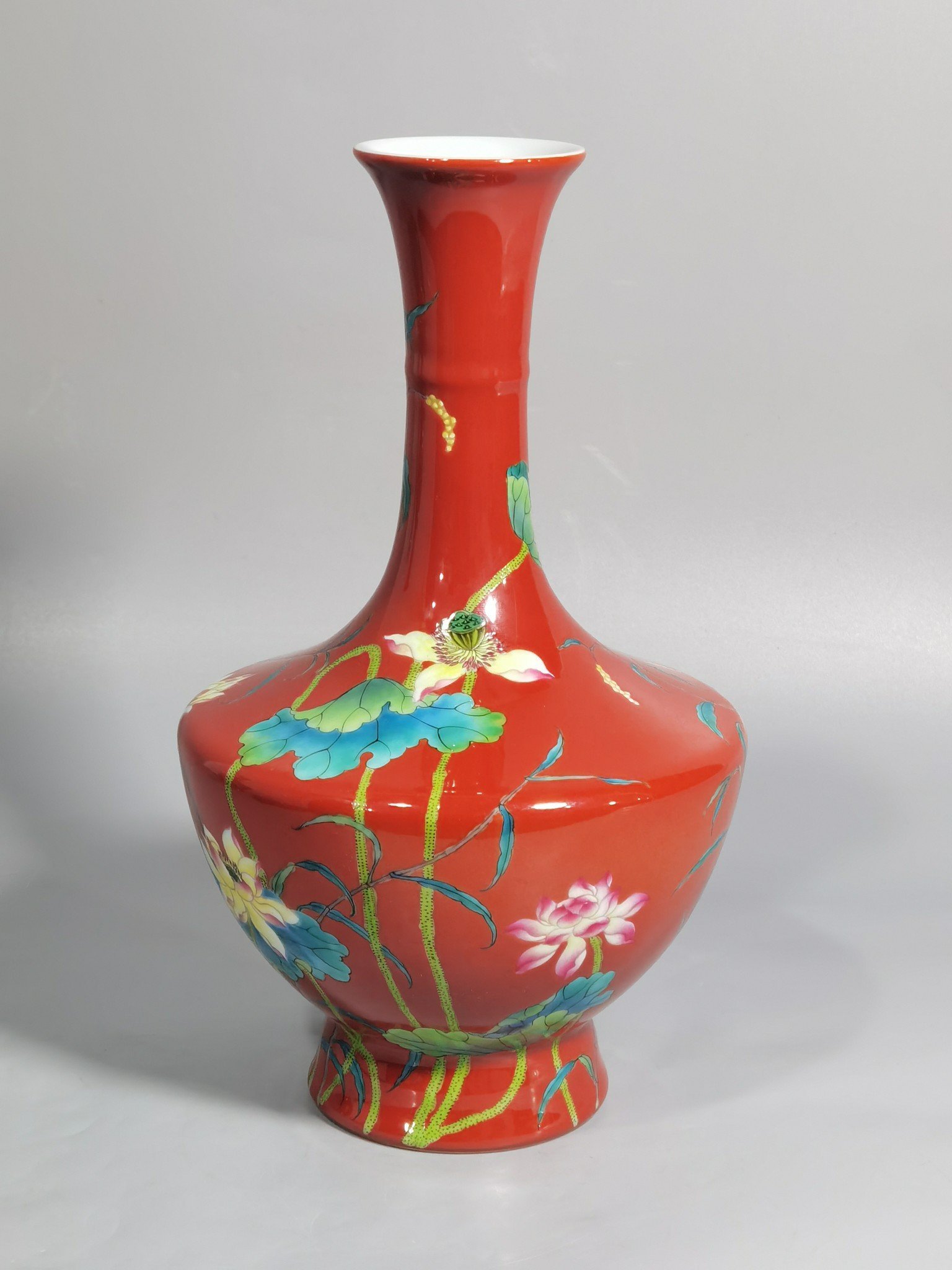 Qing Dynasty Yongzheng enamel coral red ground lotus vase