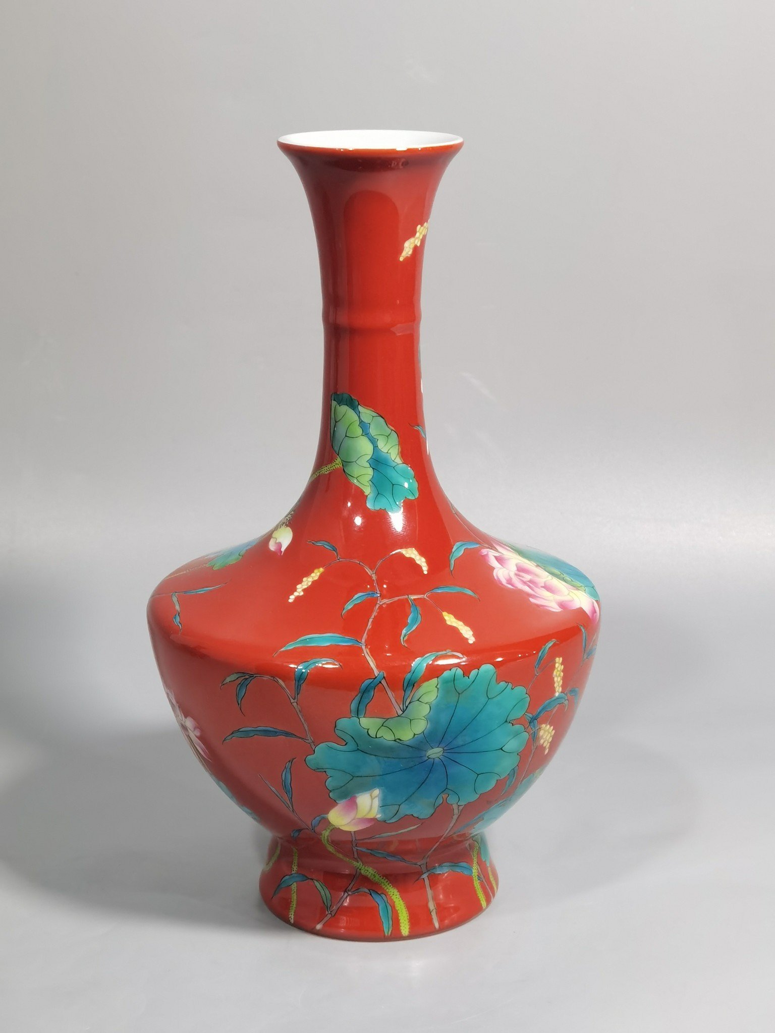 Qing Dynasty Yongzheng enamel coral red ground lotus vase