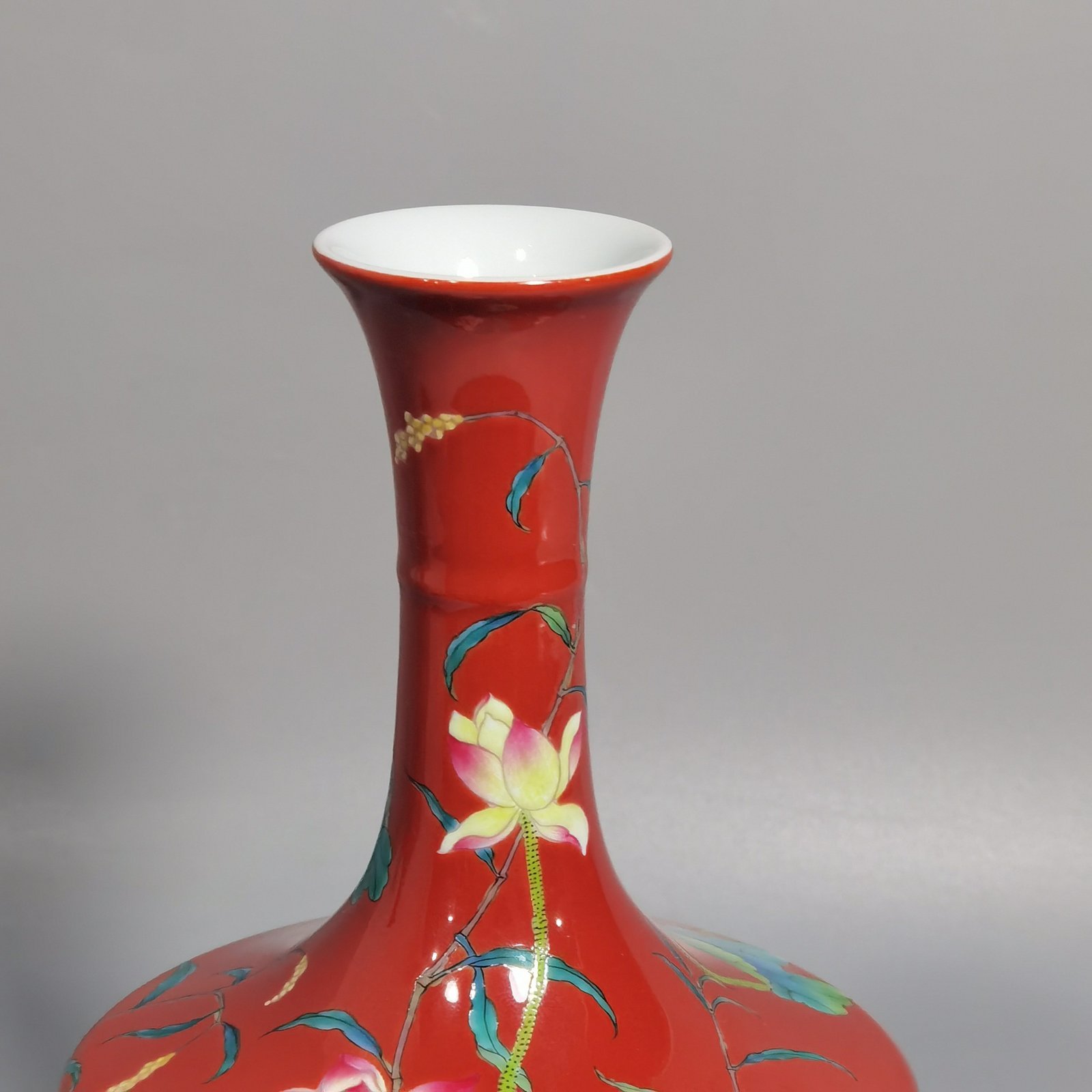 Qing Dynasty Yongzheng enamel coral red ground lotus vase