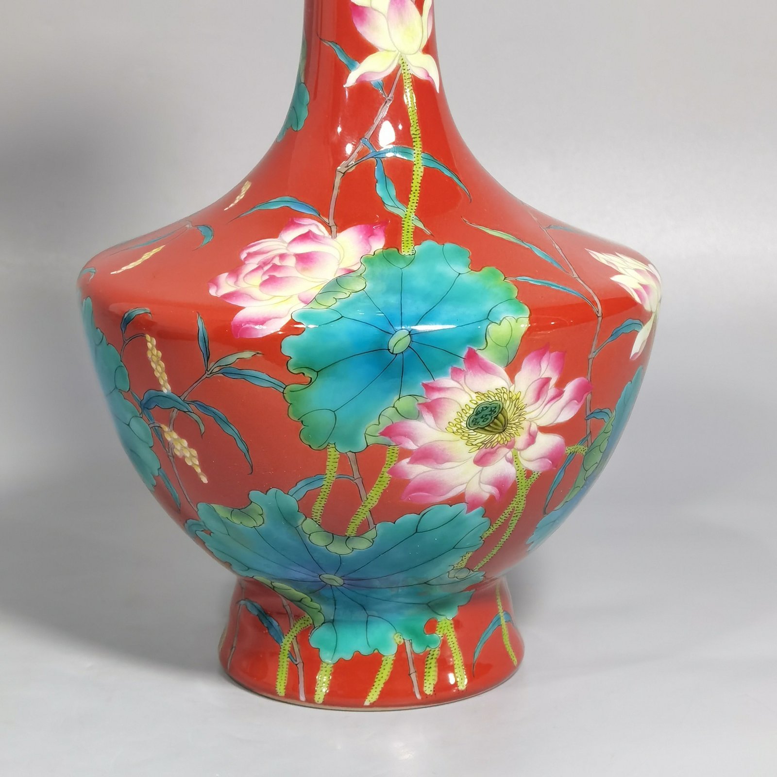 Qing Dynasty Yongzheng enamel coral red ground lotus vase