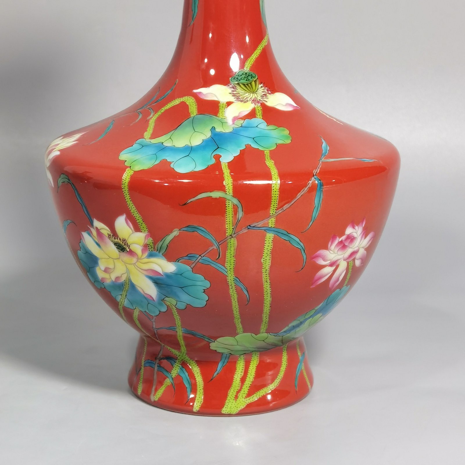 Qing Dynasty Yongzheng enamel coral red ground lotus vase