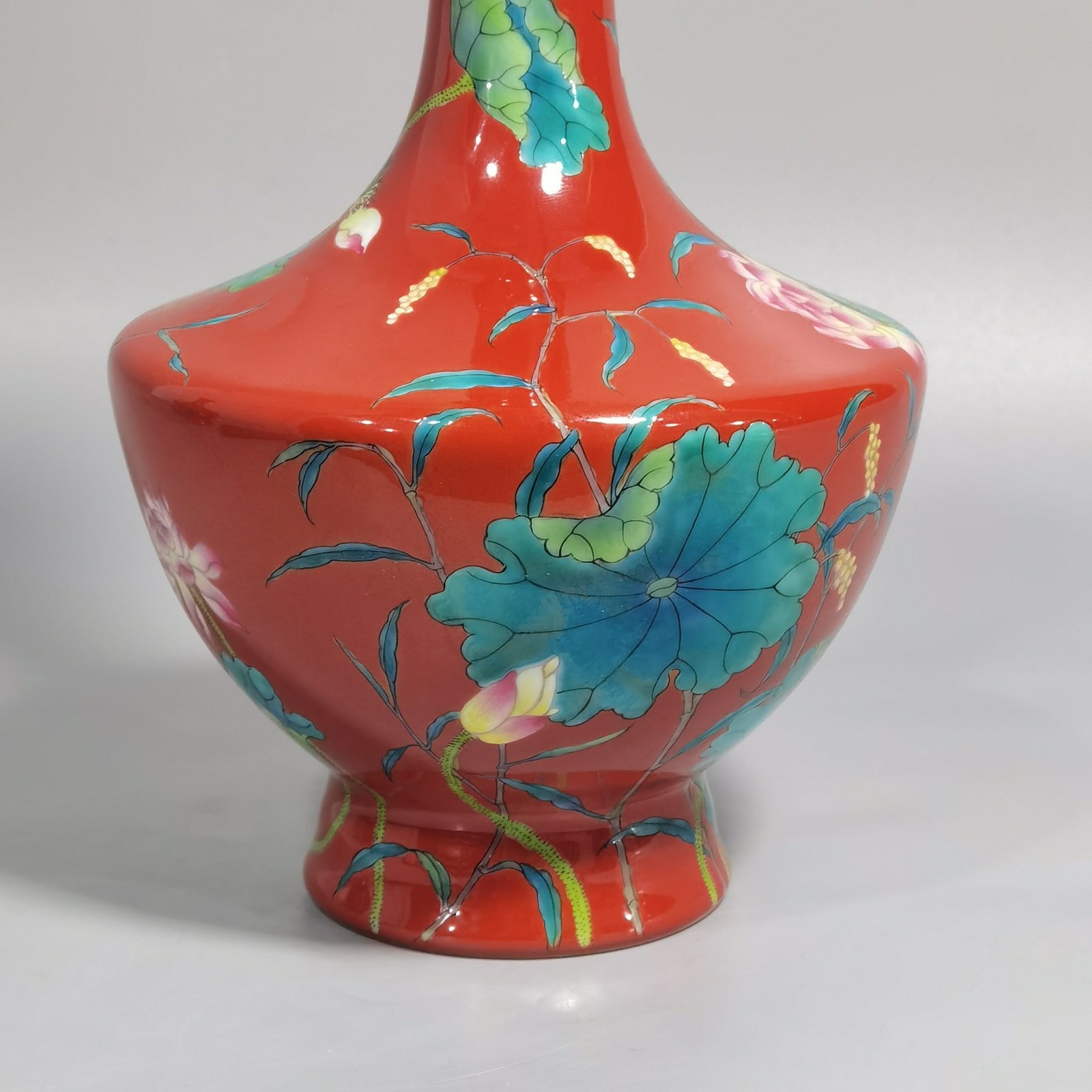 Qing Dynasty Yongzheng enamel coral red ground lotus vase