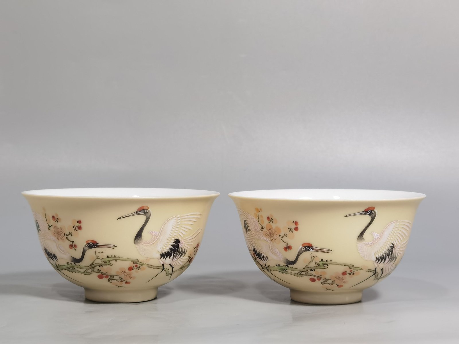 Qing Dynasty Yongzheng A pair of enamel beige-glazed plum blossom crane tea balls
