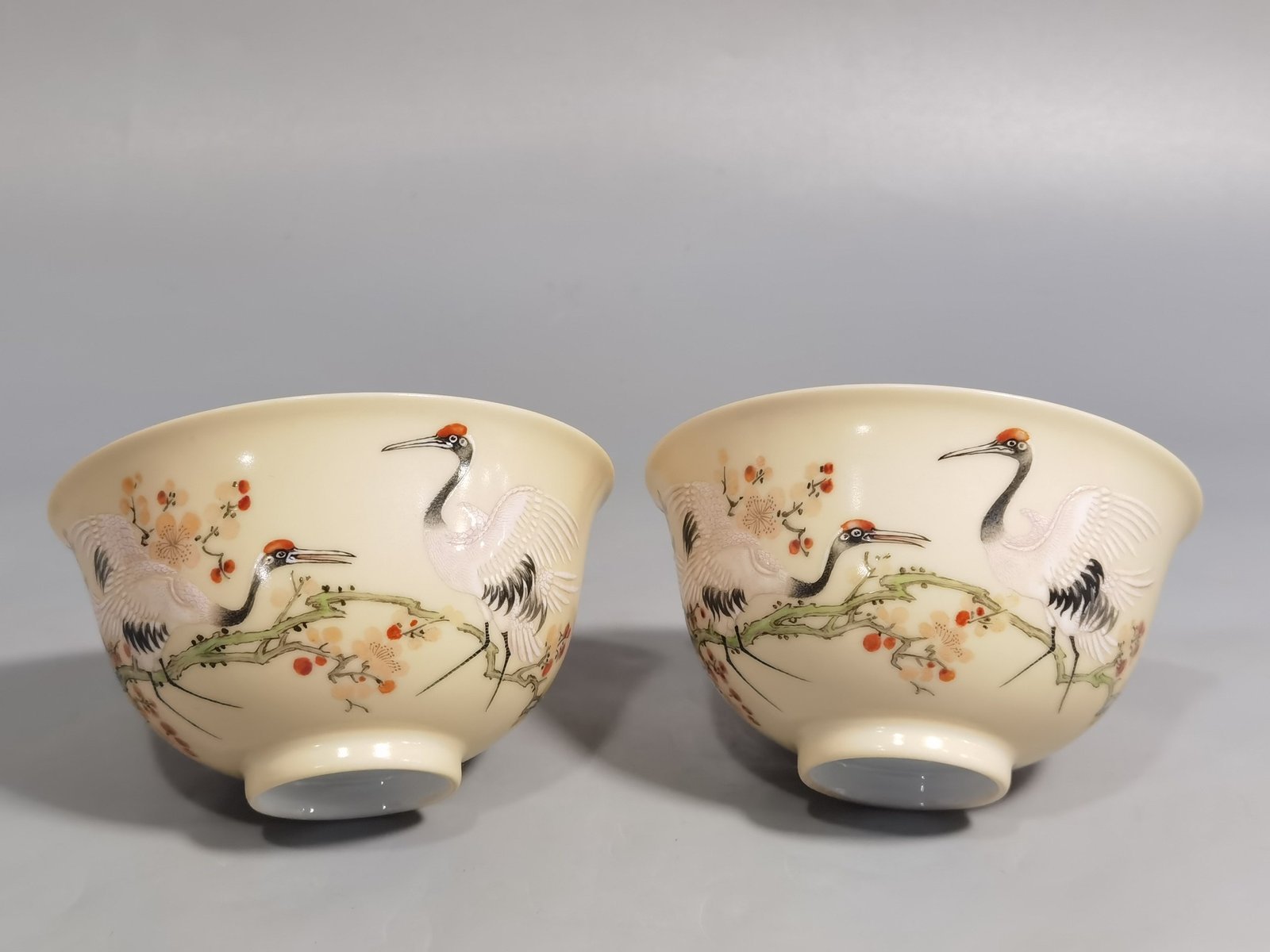 Qing Dynasty Yongzheng A pair of enamel beige-glazed plum blossom crane tea balls