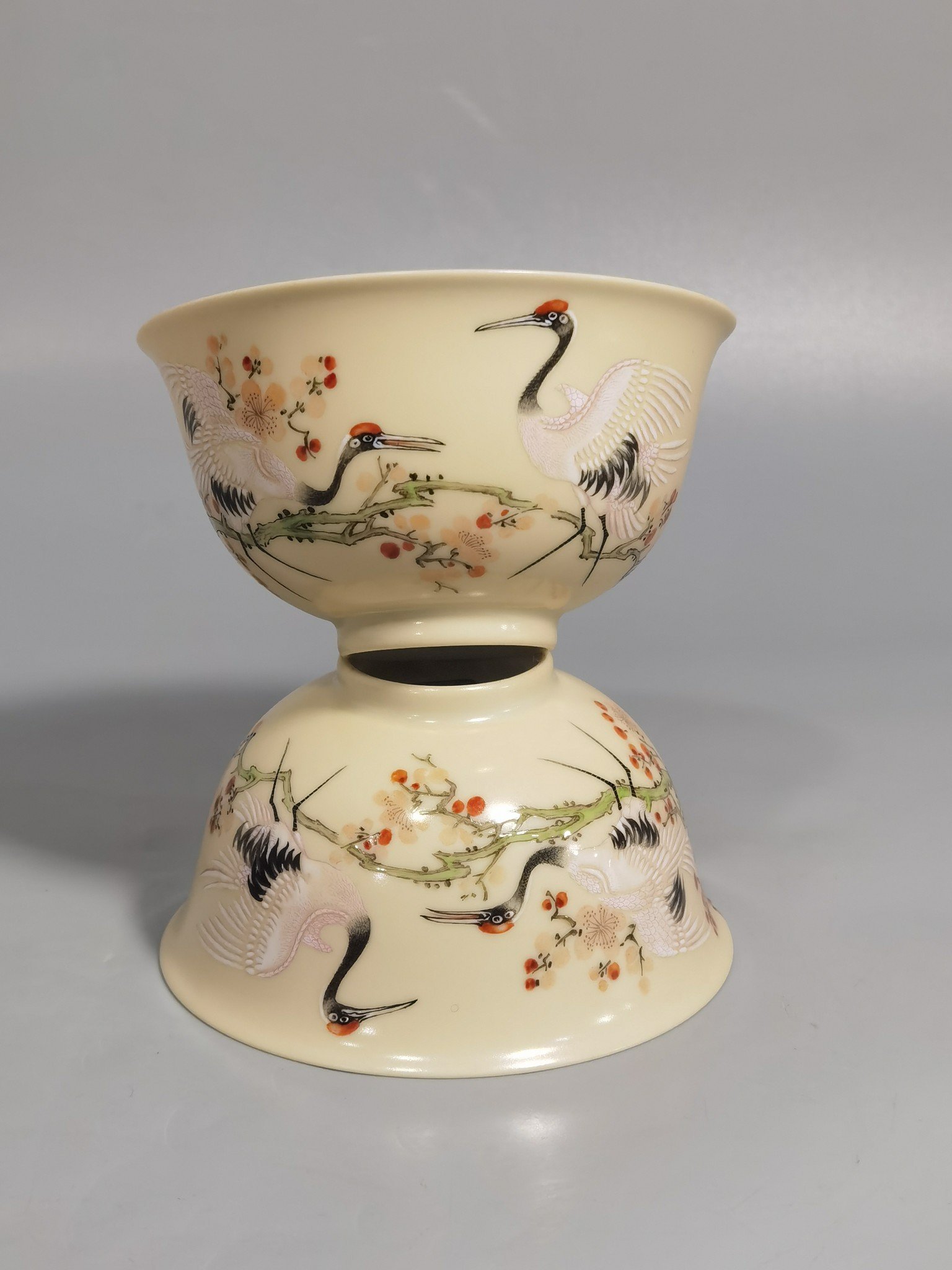 Qing Dynasty Yongzheng A pair of enamel beige-glazed plum blossom crane tea balls