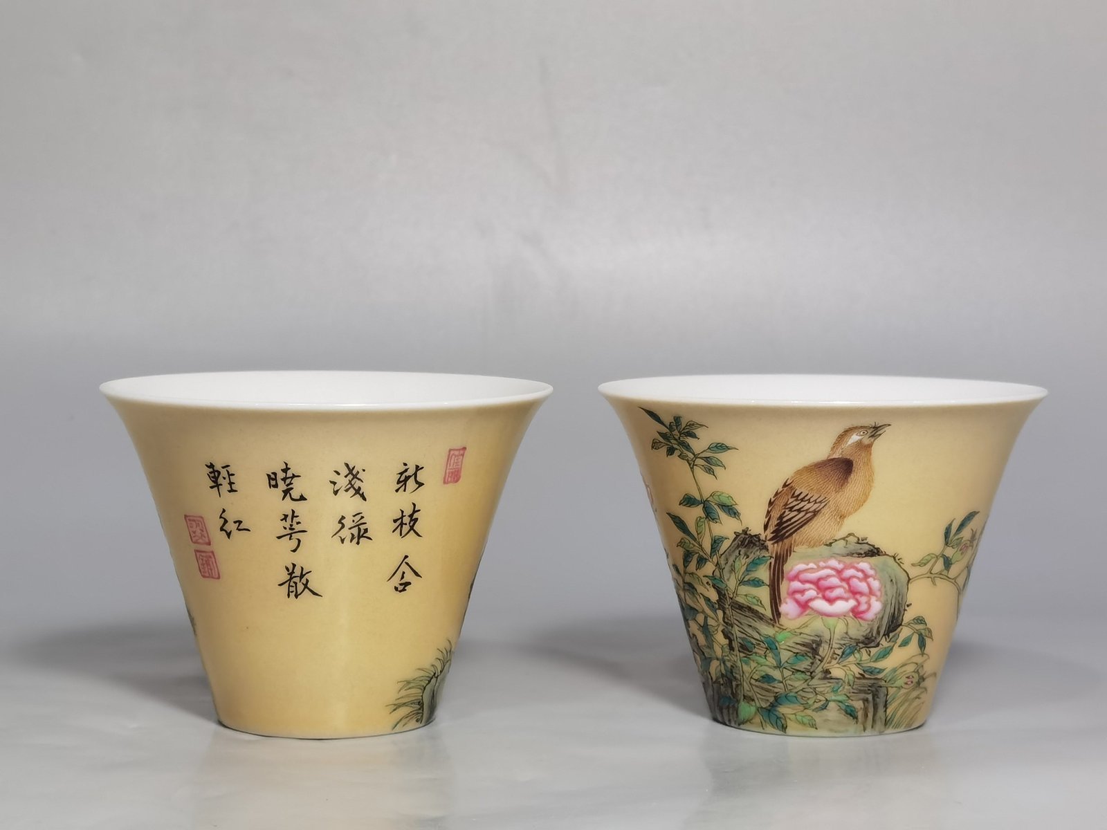 Qing Dynasty Yongzheng enamel beige glaze horseshoe cup with flower and bird pattern