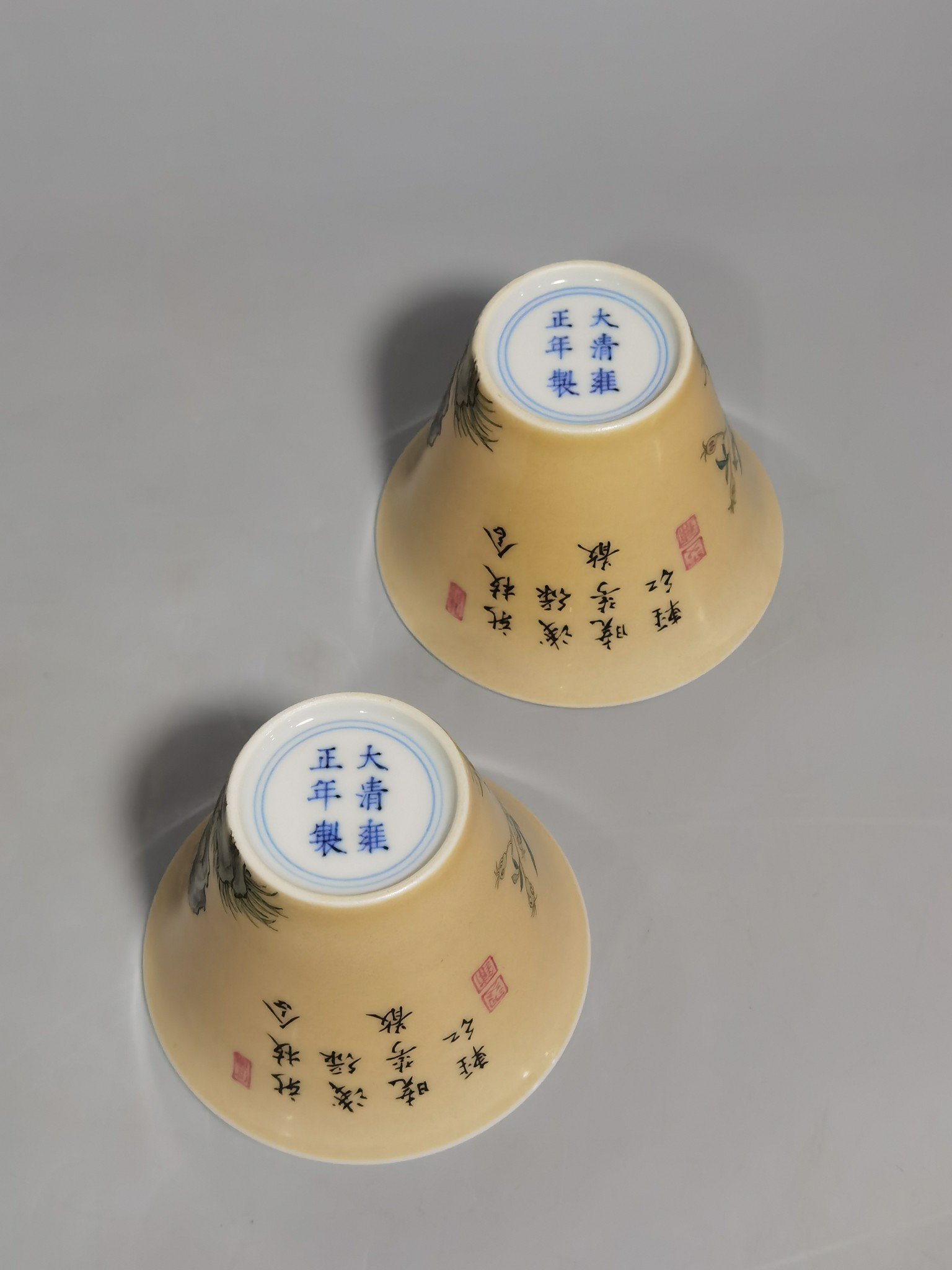 Qing Dynasty Yongzheng enamel beige glaze horseshoe cup with flower and bird pattern