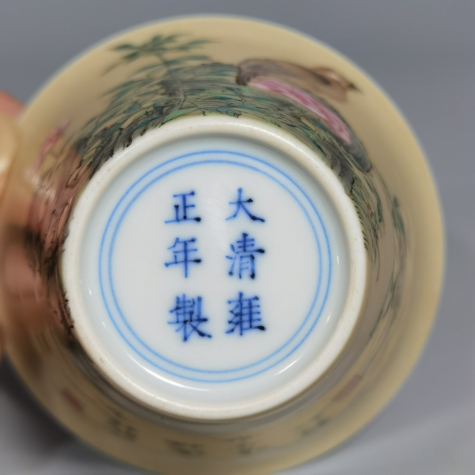 Qing Dynasty Yongzheng enamel beige glaze horseshoe cup with flower and bird pattern