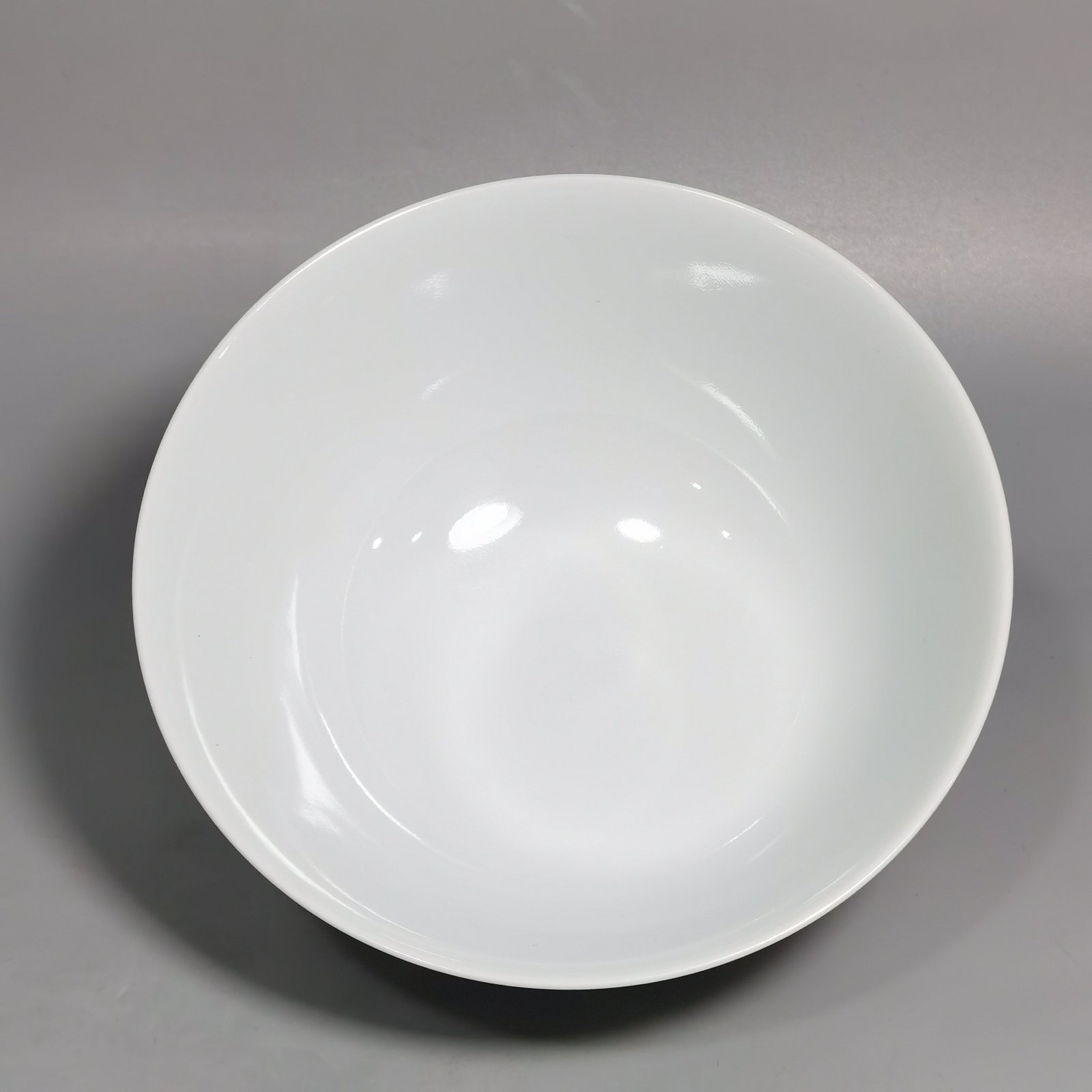 Qing Dynasty Yongzheng Enamel green ground bamboo and plum double clear bowl