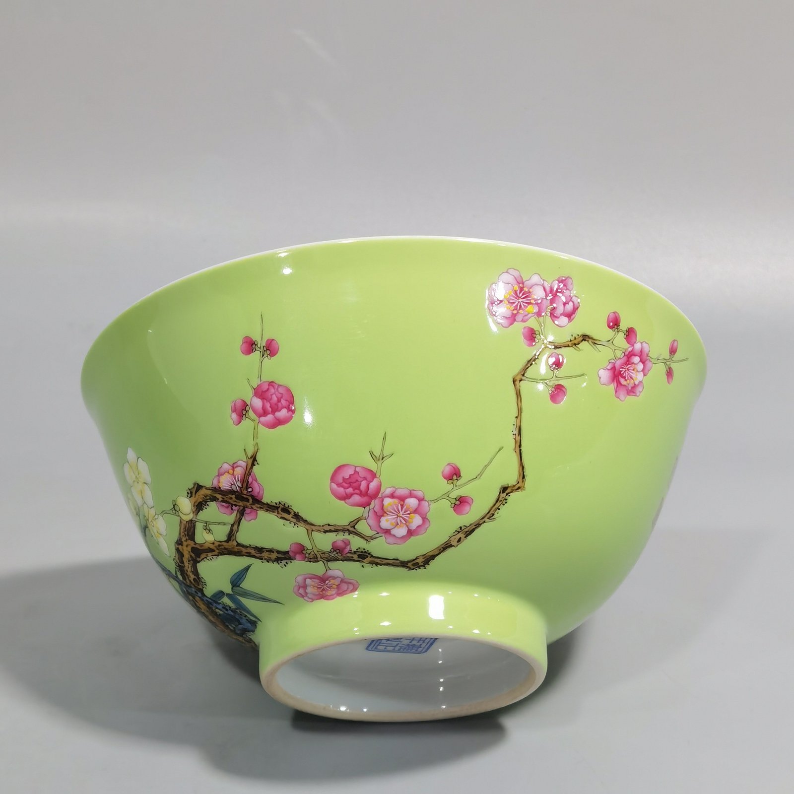 Qing Dynasty Yongzheng Enamel green ground bamboo and plum double clear bowl
