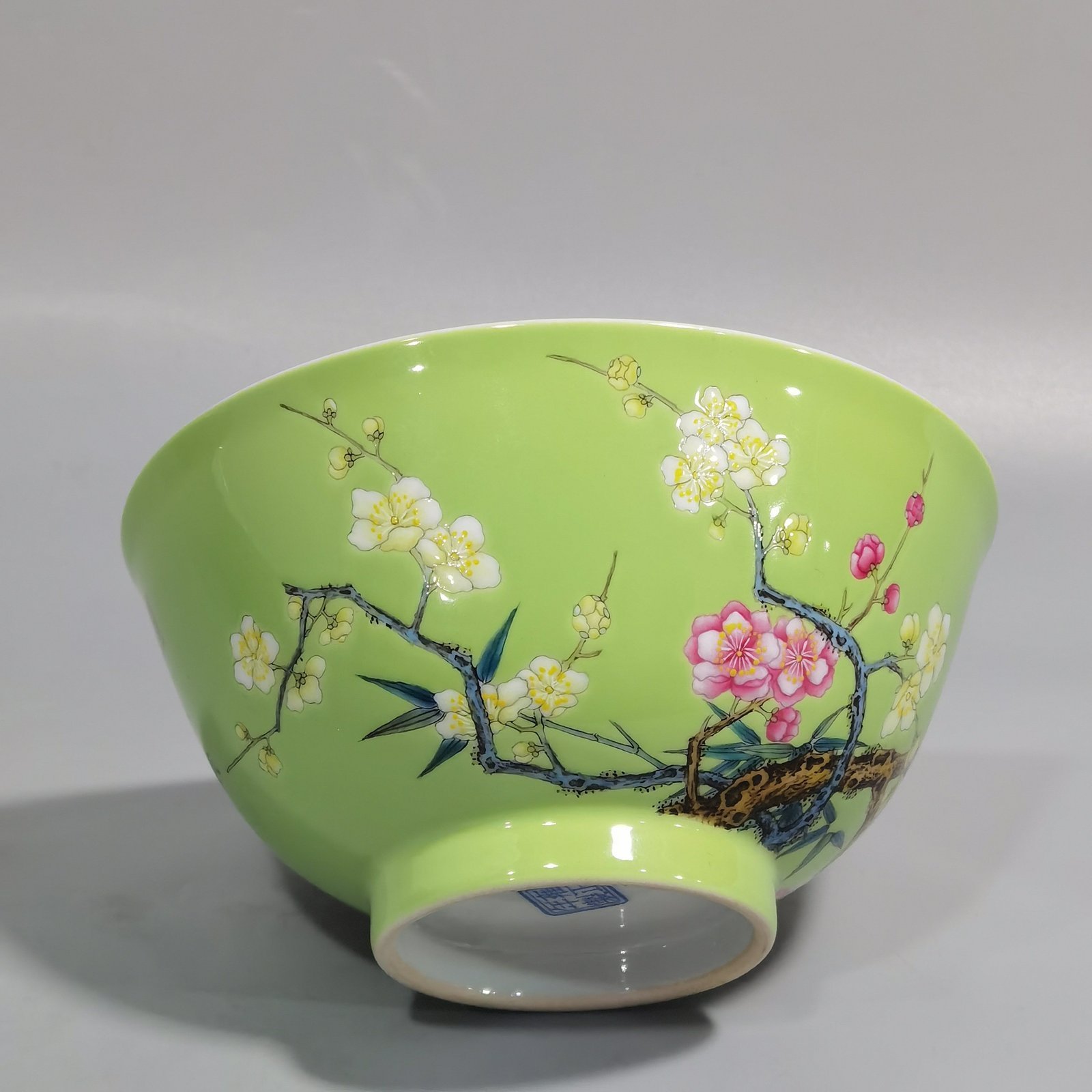 Qing Dynasty Yongzheng Enamel green ground bamboo and plum double clear bowl