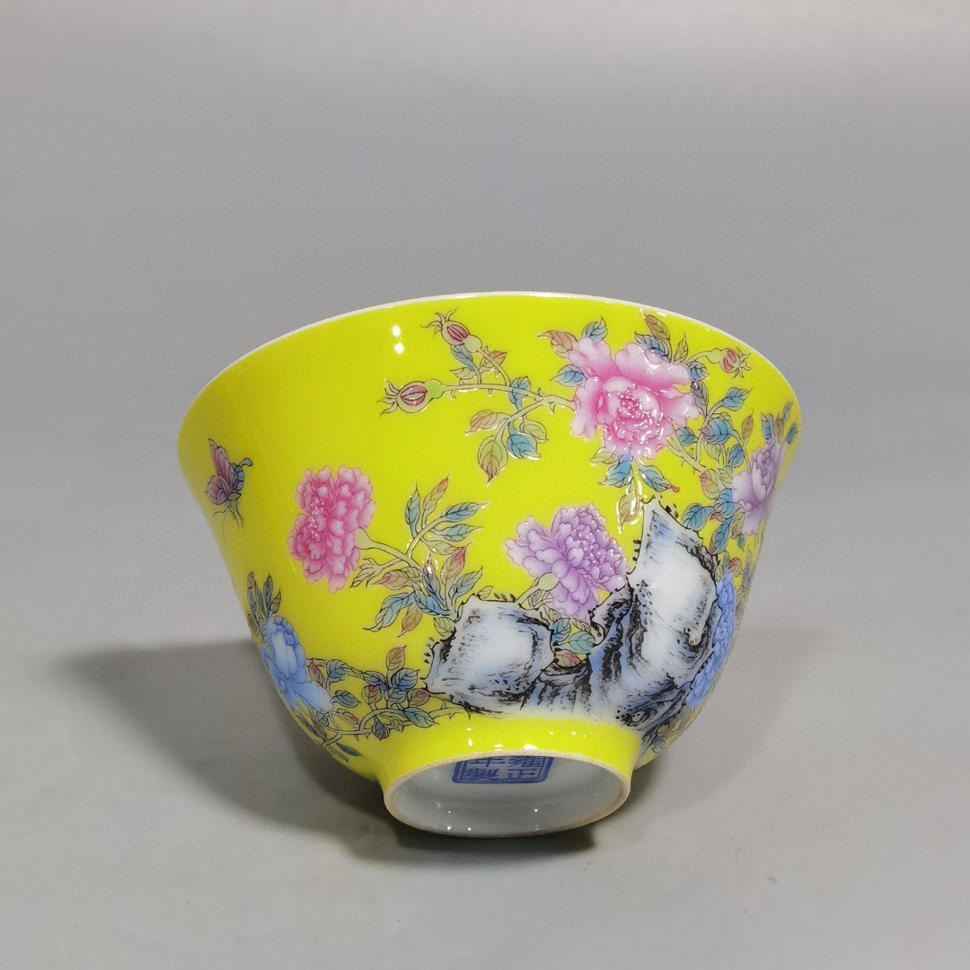 Qing Dynasty Yongzheng a pair of enamel yellow ground peony flower cups