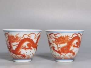 Qing Dynasty Yongzheng alum red color double dragon cup