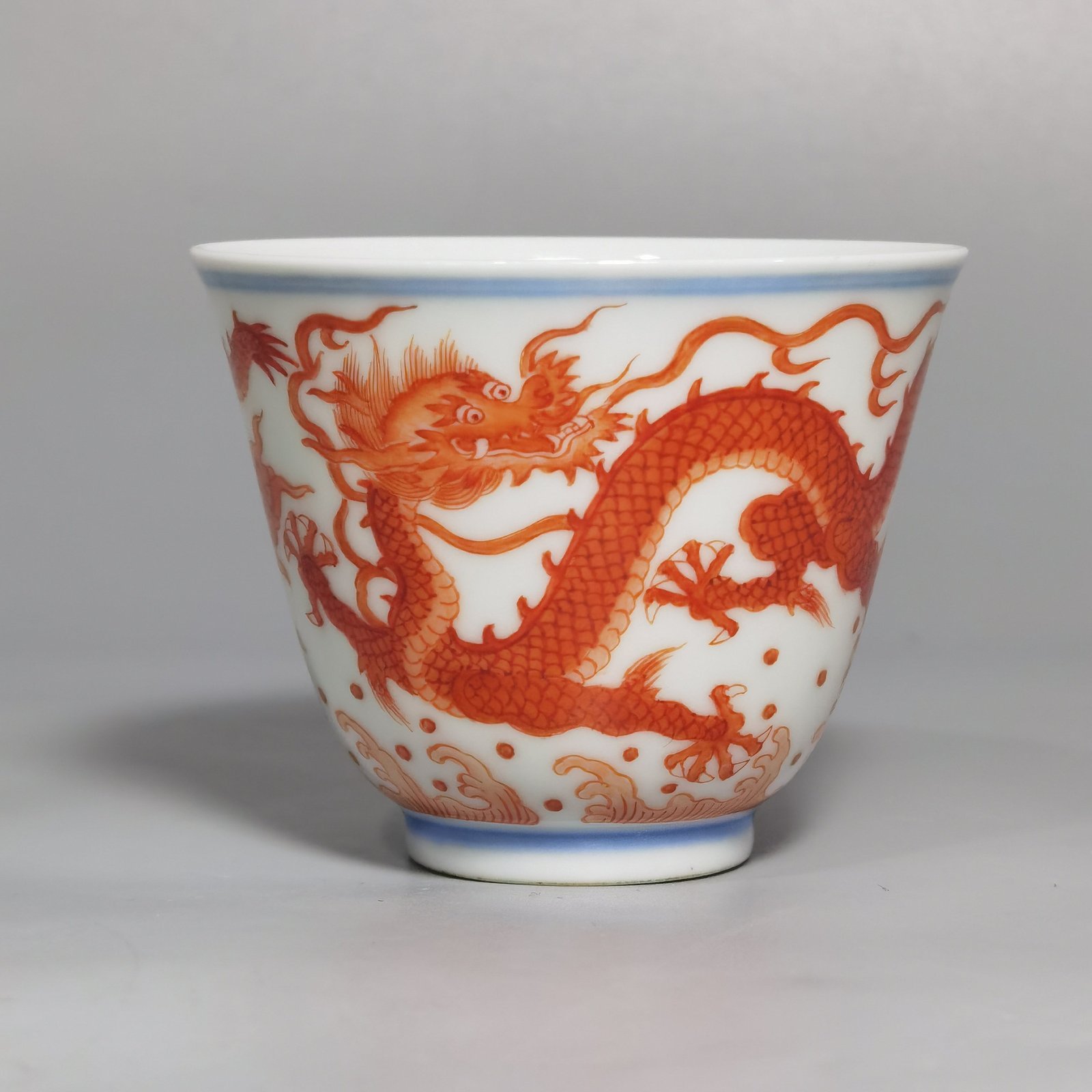 Qing Dynasty Yongzheng alum red color double dragon cup