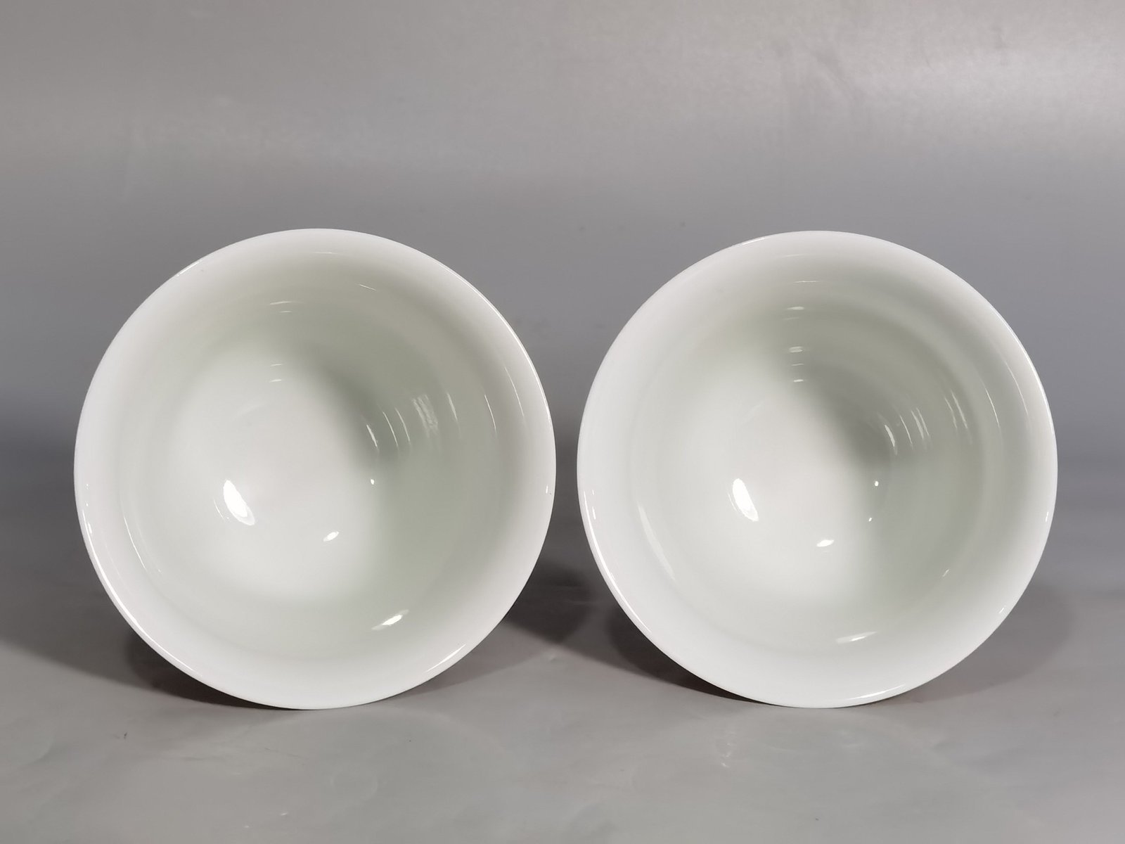 Qing Dynasty Yongzheng beige glazed pastel bell cup with a poem about good luck