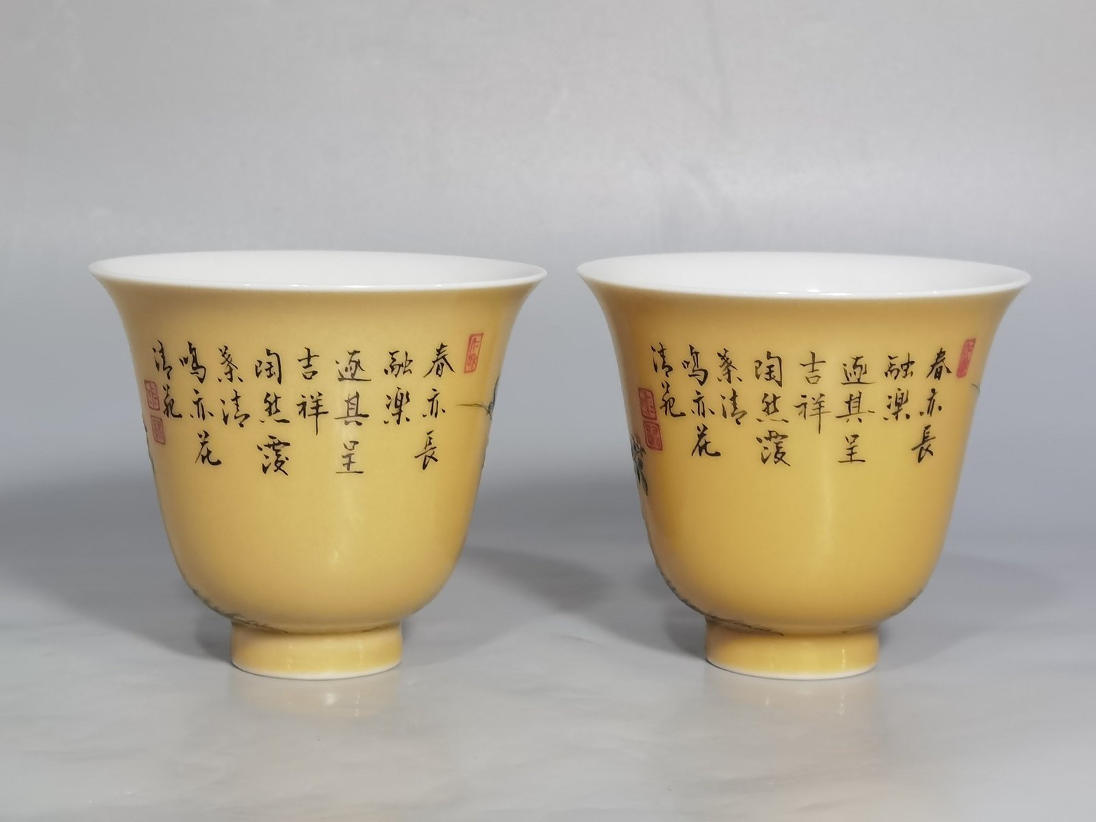 Qing Dynasty Yongzheng beige glazed pastel bell cup with a poem about good luck
