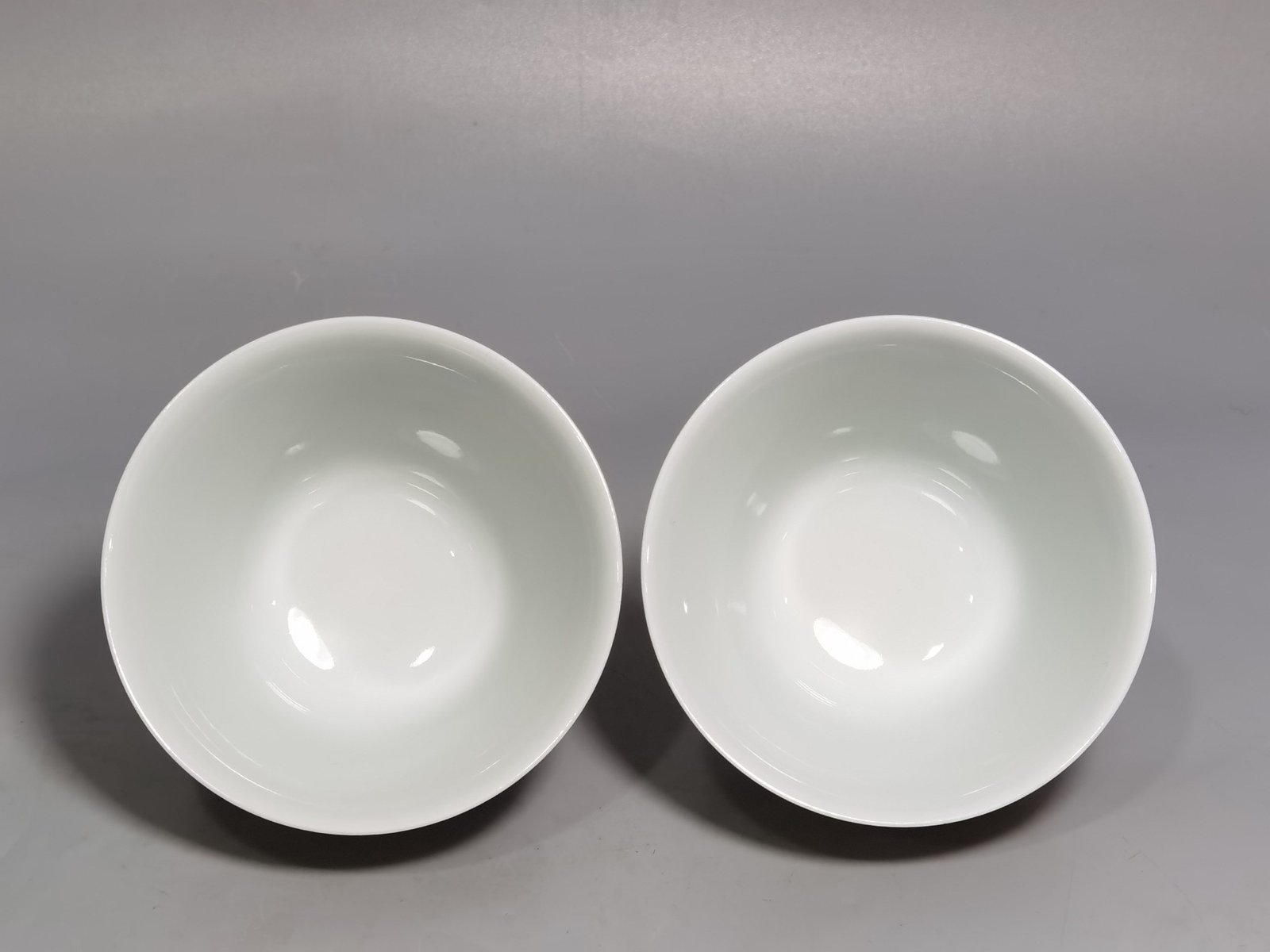 Qing Dynasty Yongzheng A pair of beige-glazed pastel squirrel-grape cups