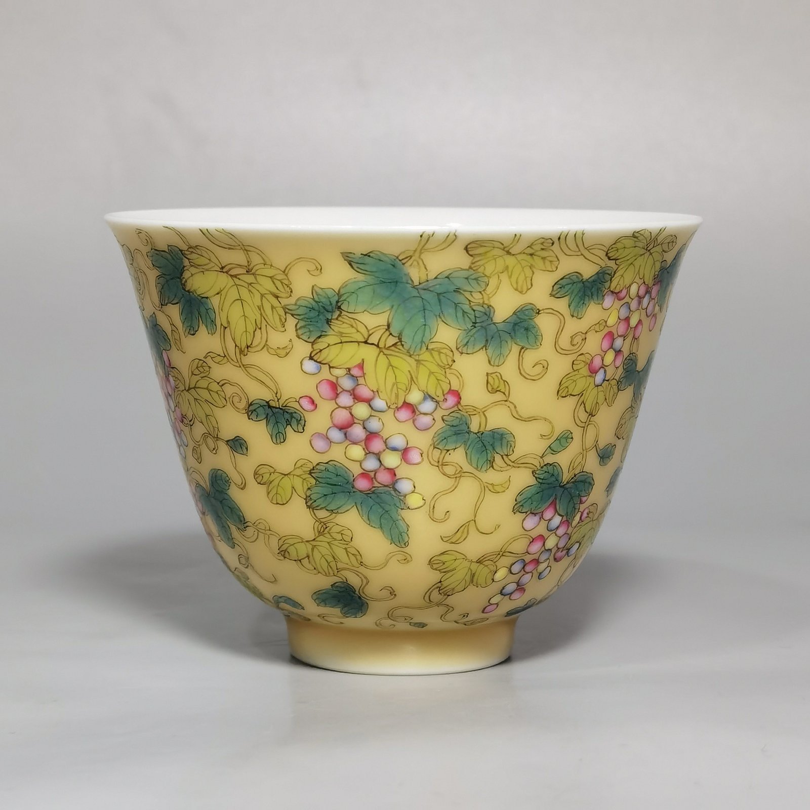 Qing Dynasty Yongzheng A pair of beige-glazed pastel squirrel-grape cups