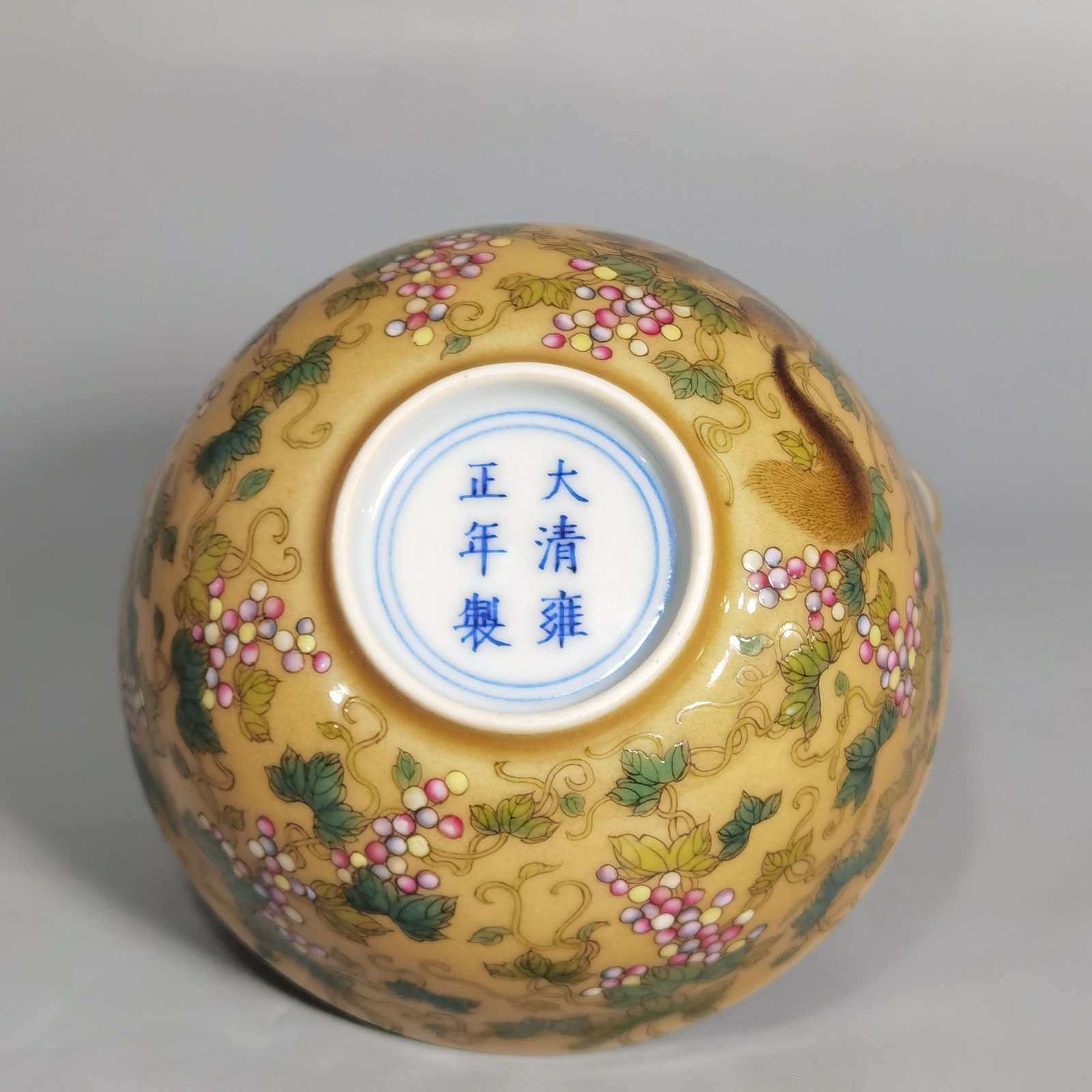 Qing Dynasty Yongzheng A pair of beige-glazed pastel squirrel-grape cups