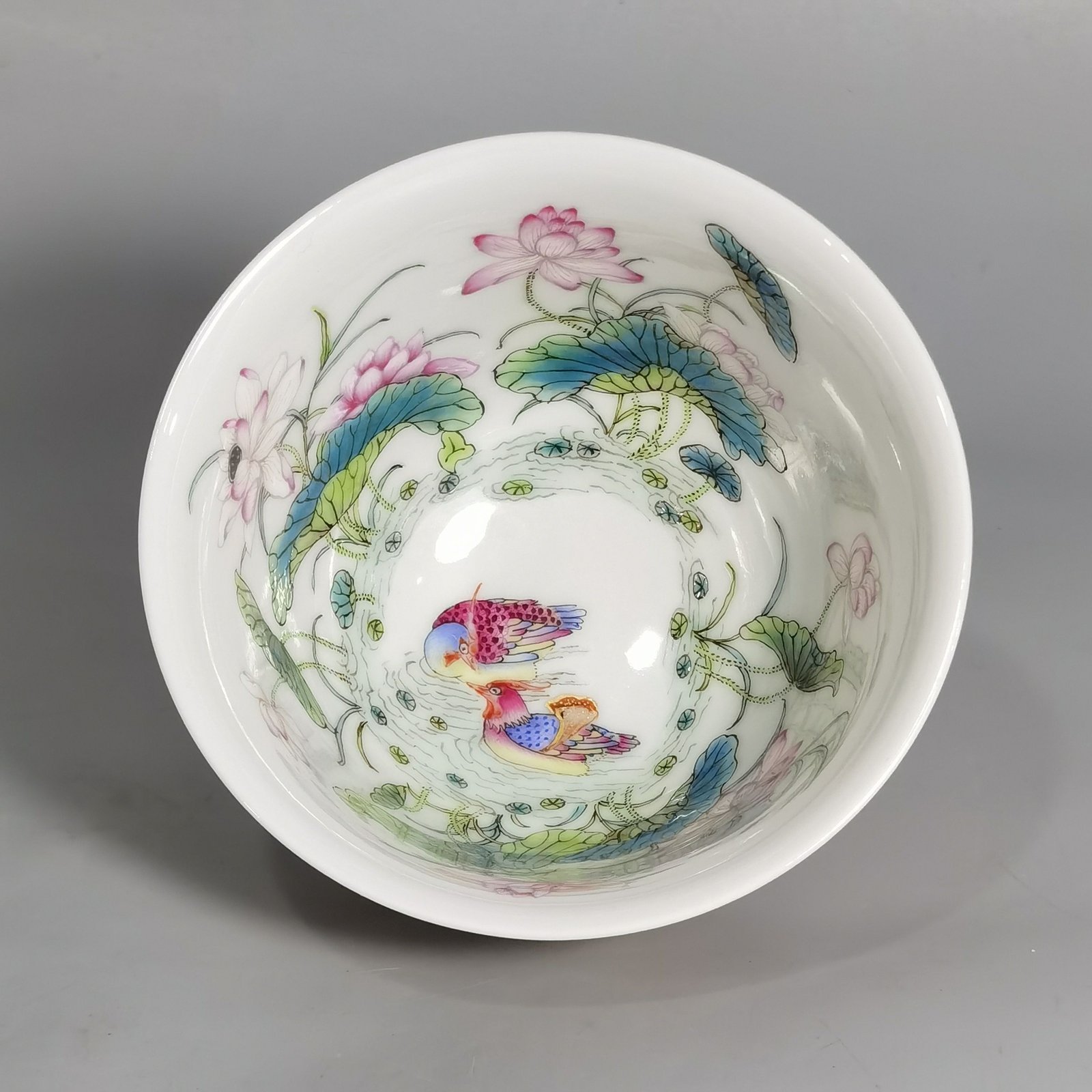 Qing Dynasty Yongzheng A pair of beige-glazed pastel mandarin duck and lotus cups