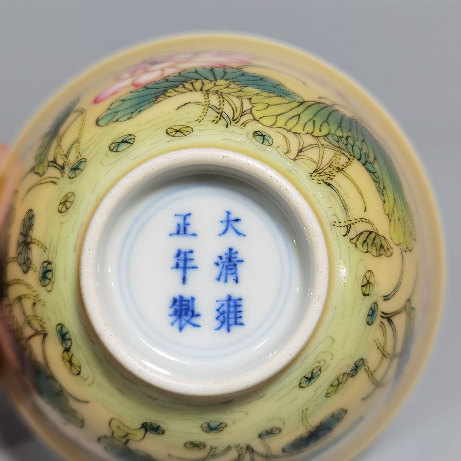 Qing Dynasty Yongzheng A pair of beige-glazed pastel mandarin duck and lotus cups