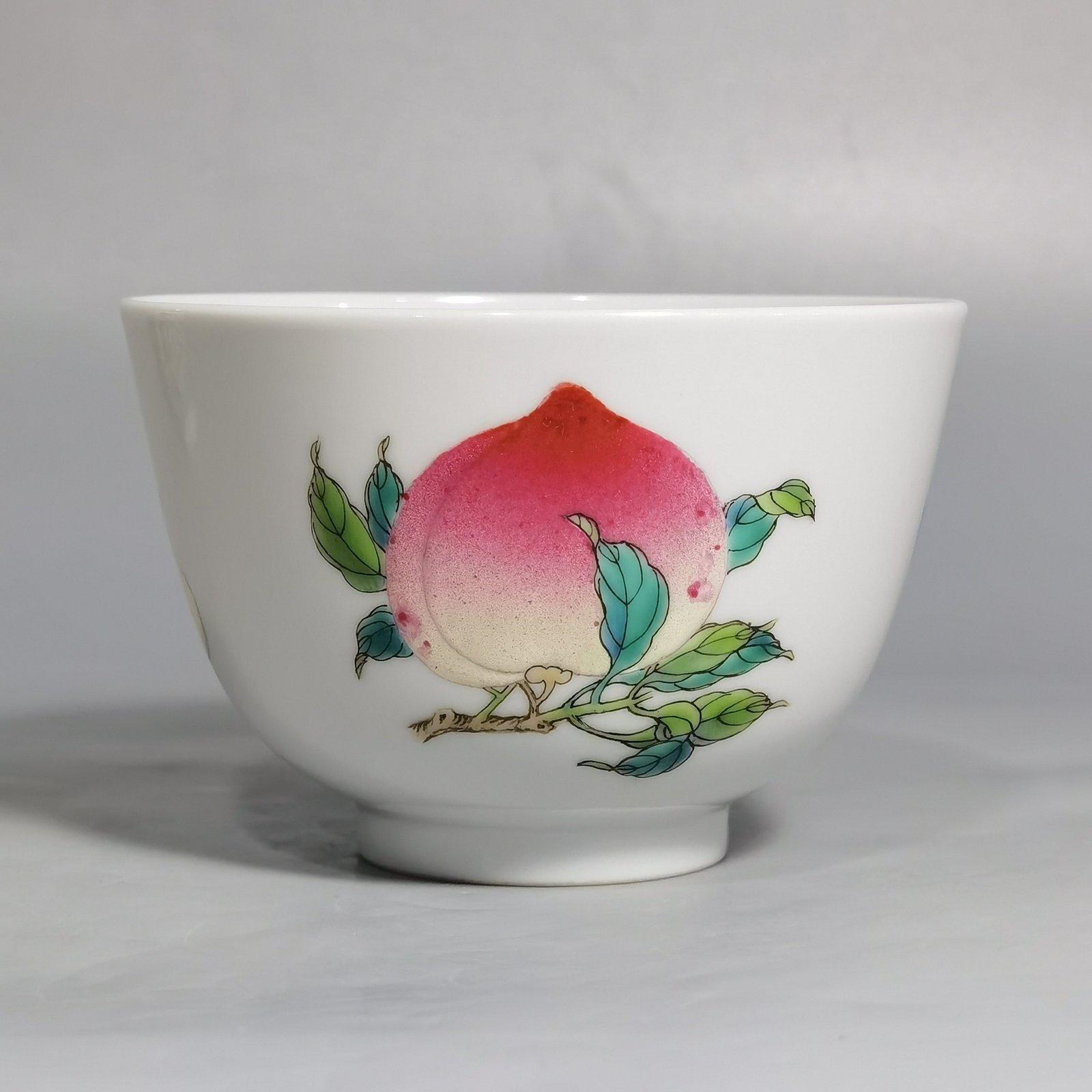 Qing Dynasty Yongzheng A pair of pastel three-dot pattern cups