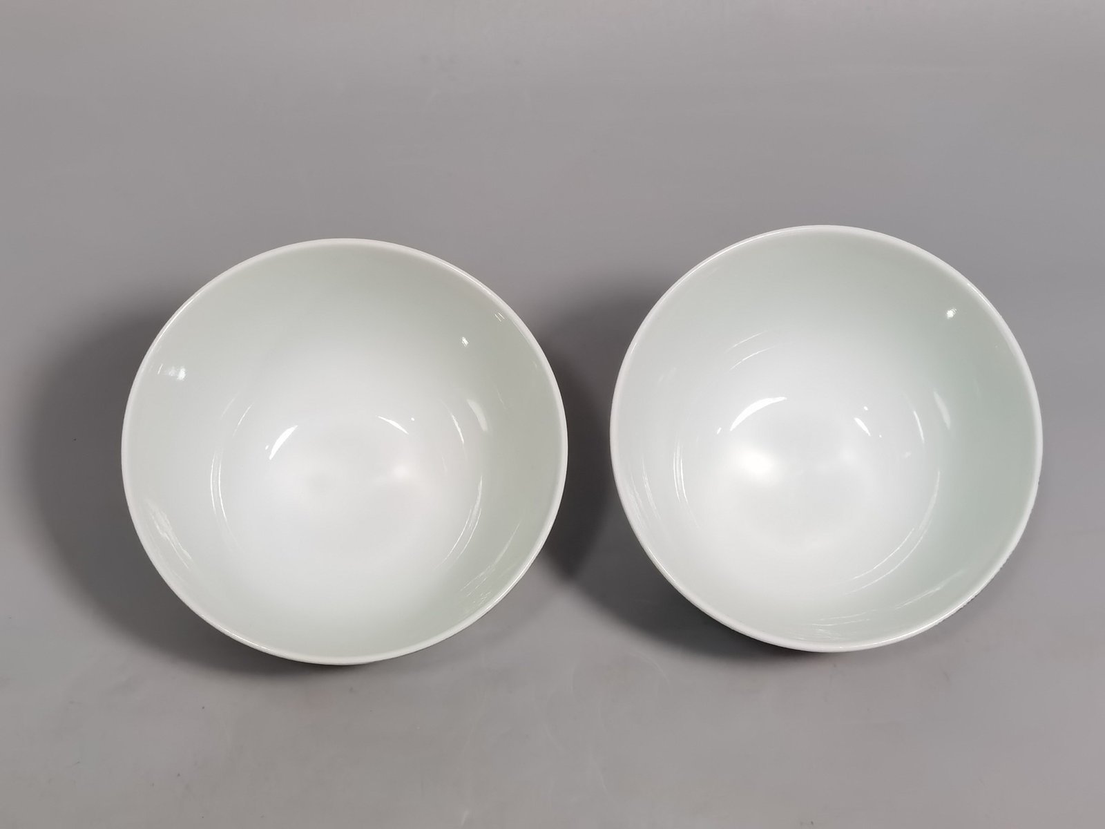 Qing Dynasty Yongzheng A pair of pastel Sanniang godson cups