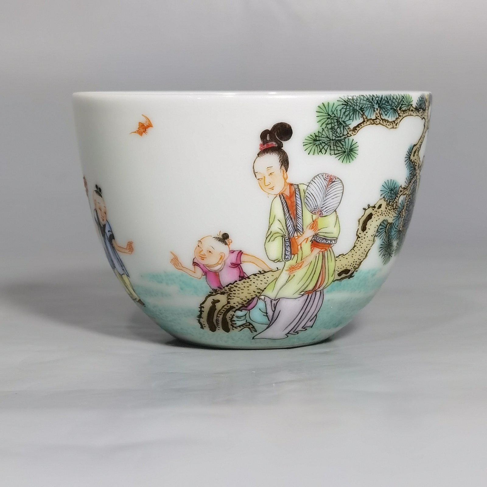 Qing Dynasty Yongzheng A pair of pastel Sanniang godson cups