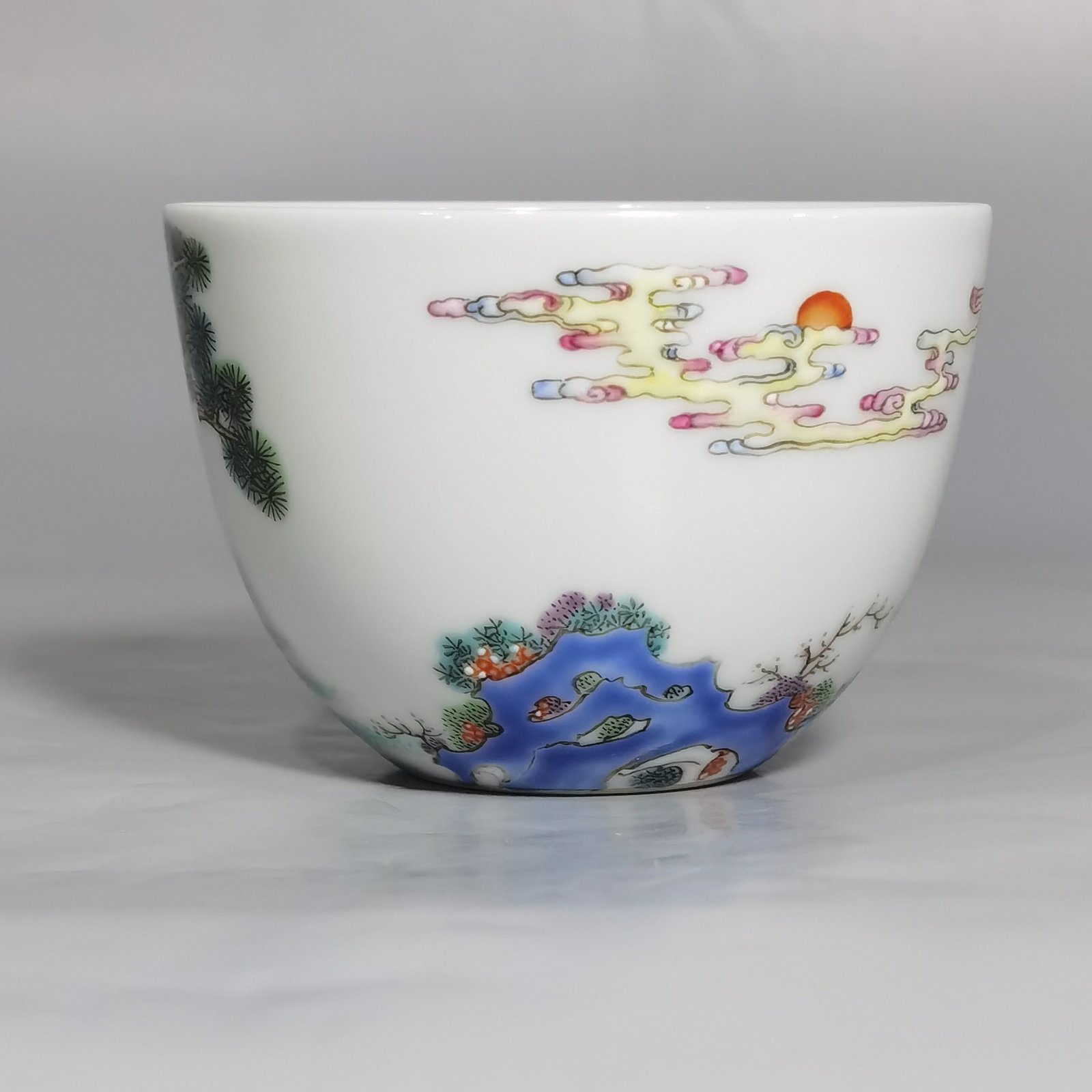 Qing Dynasty Yongzheng A pair of pastel Sanniang godson cups