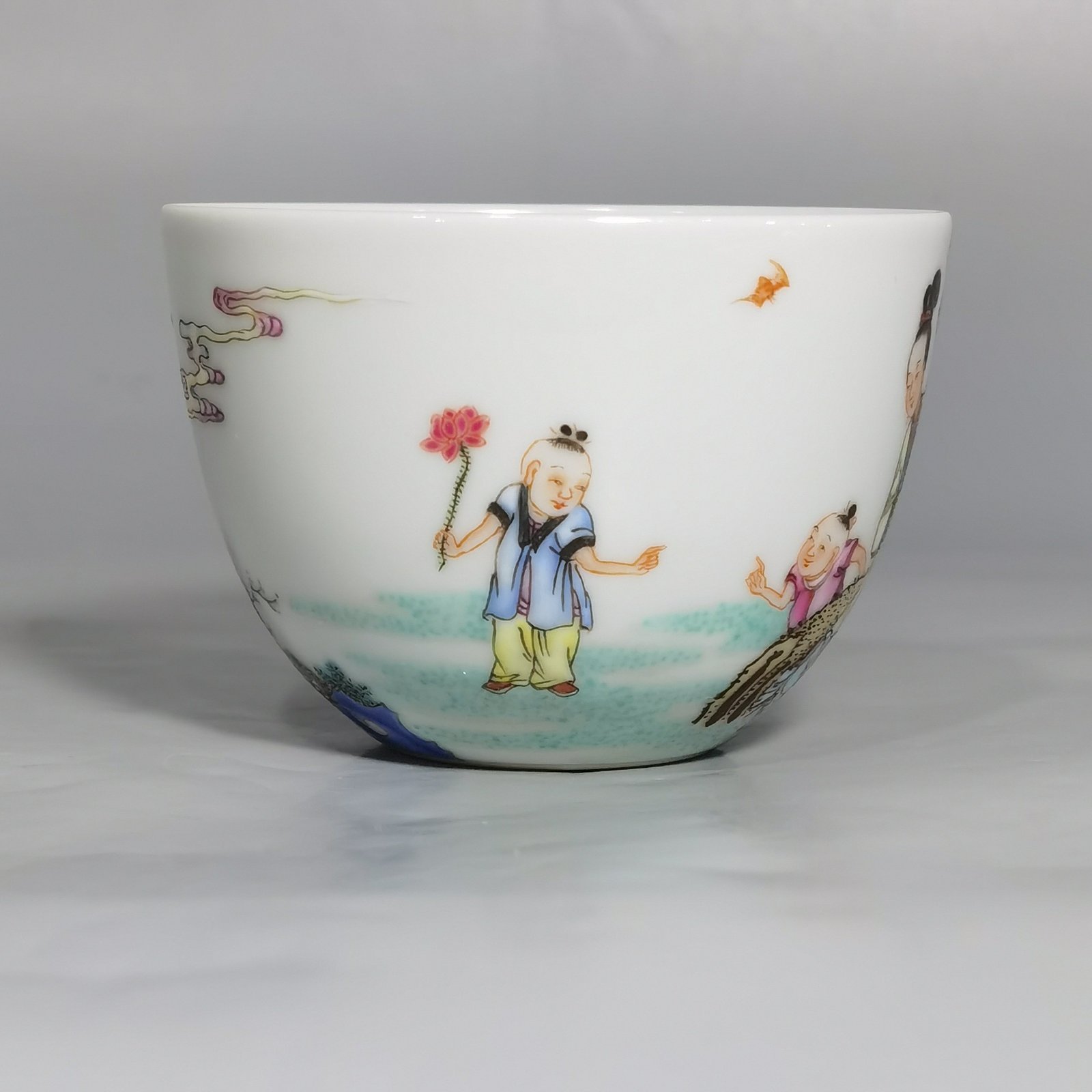 Qing Dynasty Yongzheng A pair of pastel Sanniang godson cups