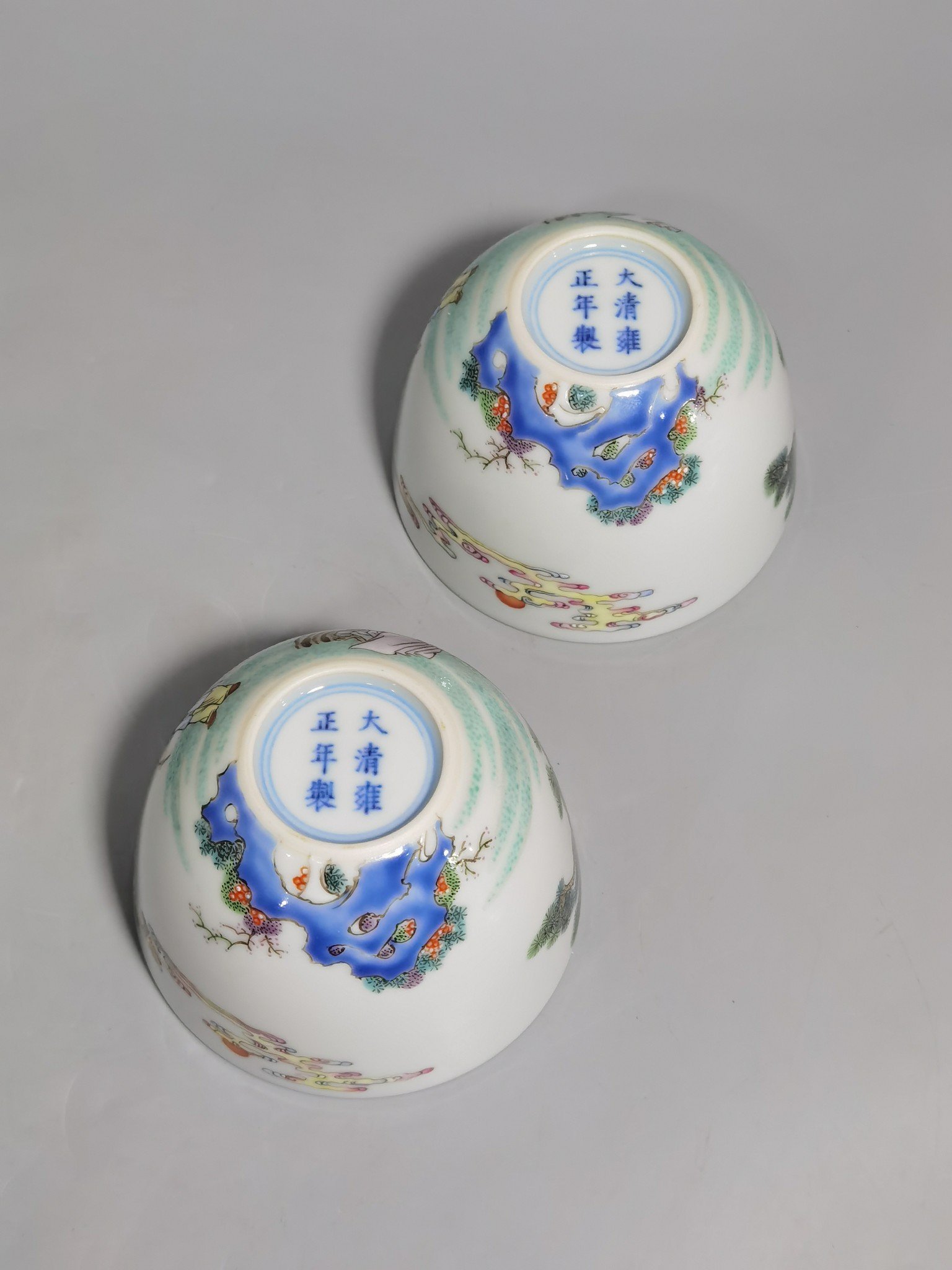 Qing Dynasty Yongzheng A pair of pastel Sanniang godson cups