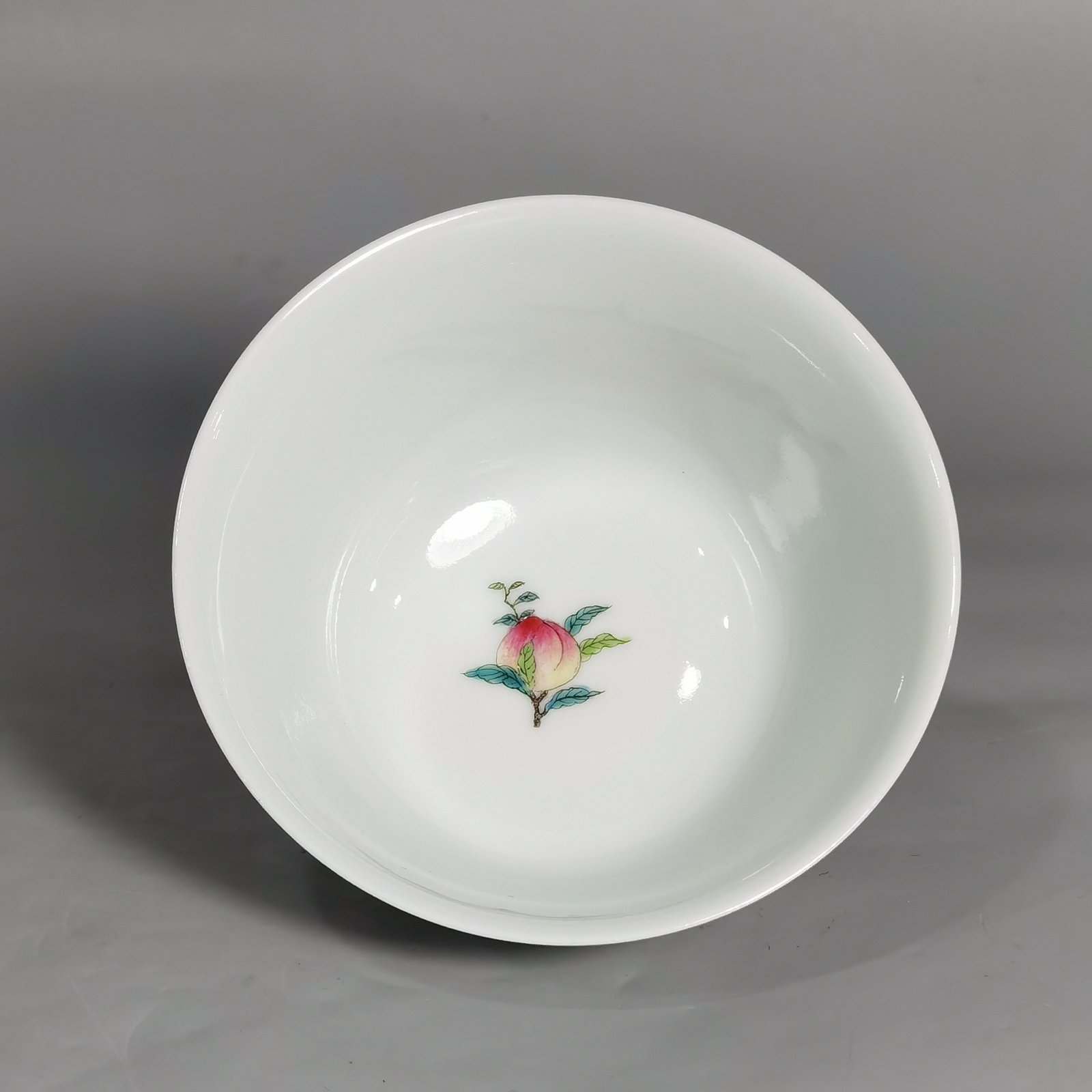 Qing Dynasty Yongzheng famille rose peach horseshoe cup with figures and stories