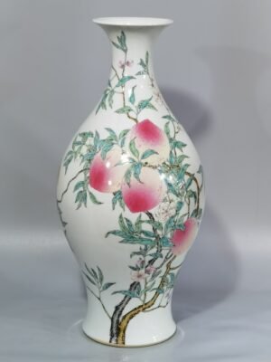 Qing Dynasty Yongzheng famille rose eight peach olive bottle