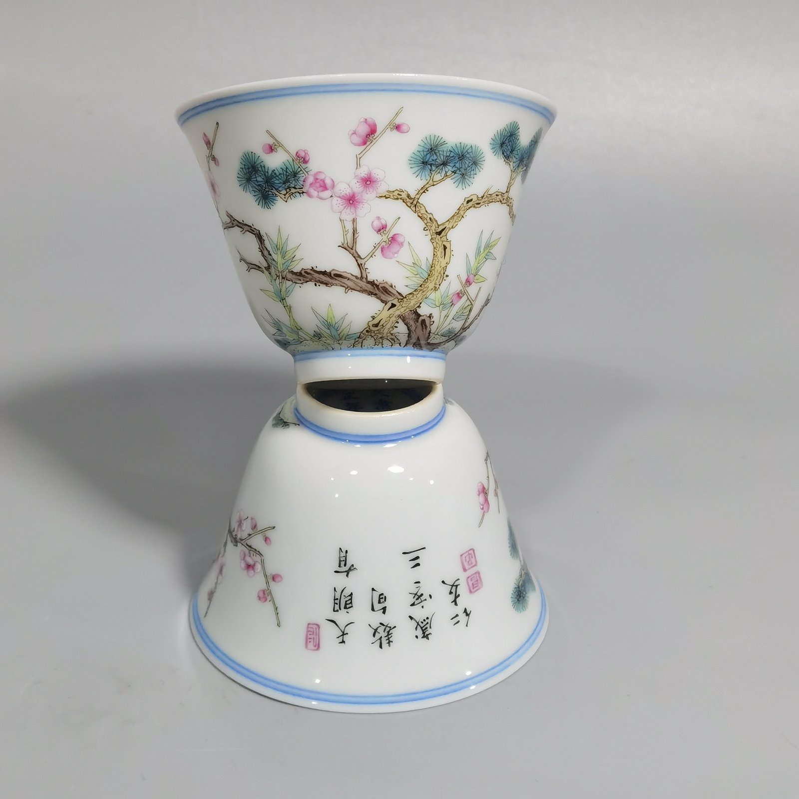 Qing Dynasty Yongzheng a pair of pastel-coloured cups with poems