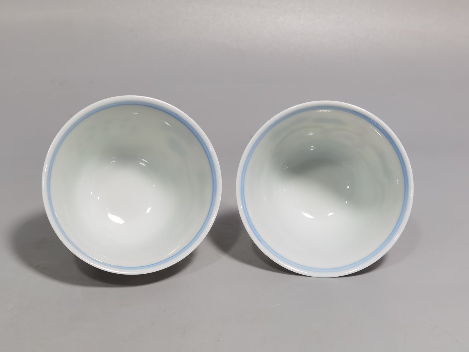 Qing Dynasty Yongzheng a pair of pastel-coloured cups with poems