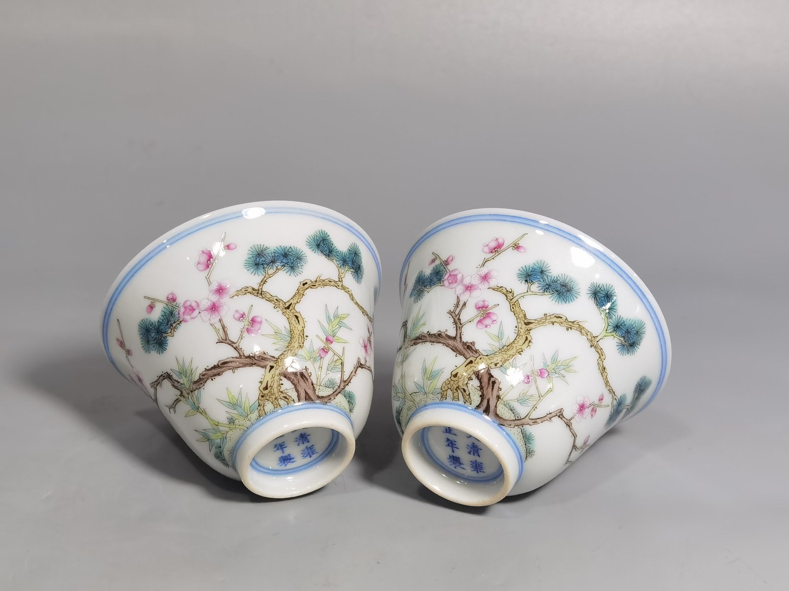 Qing Dynasty Yongzheng a pair of pastel-coloured cups with poems