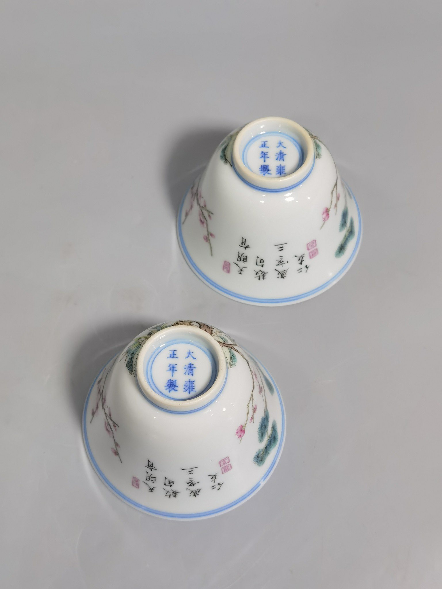 Qing Dynasty Yongzheng a pair of pastel-coloured cups with poems