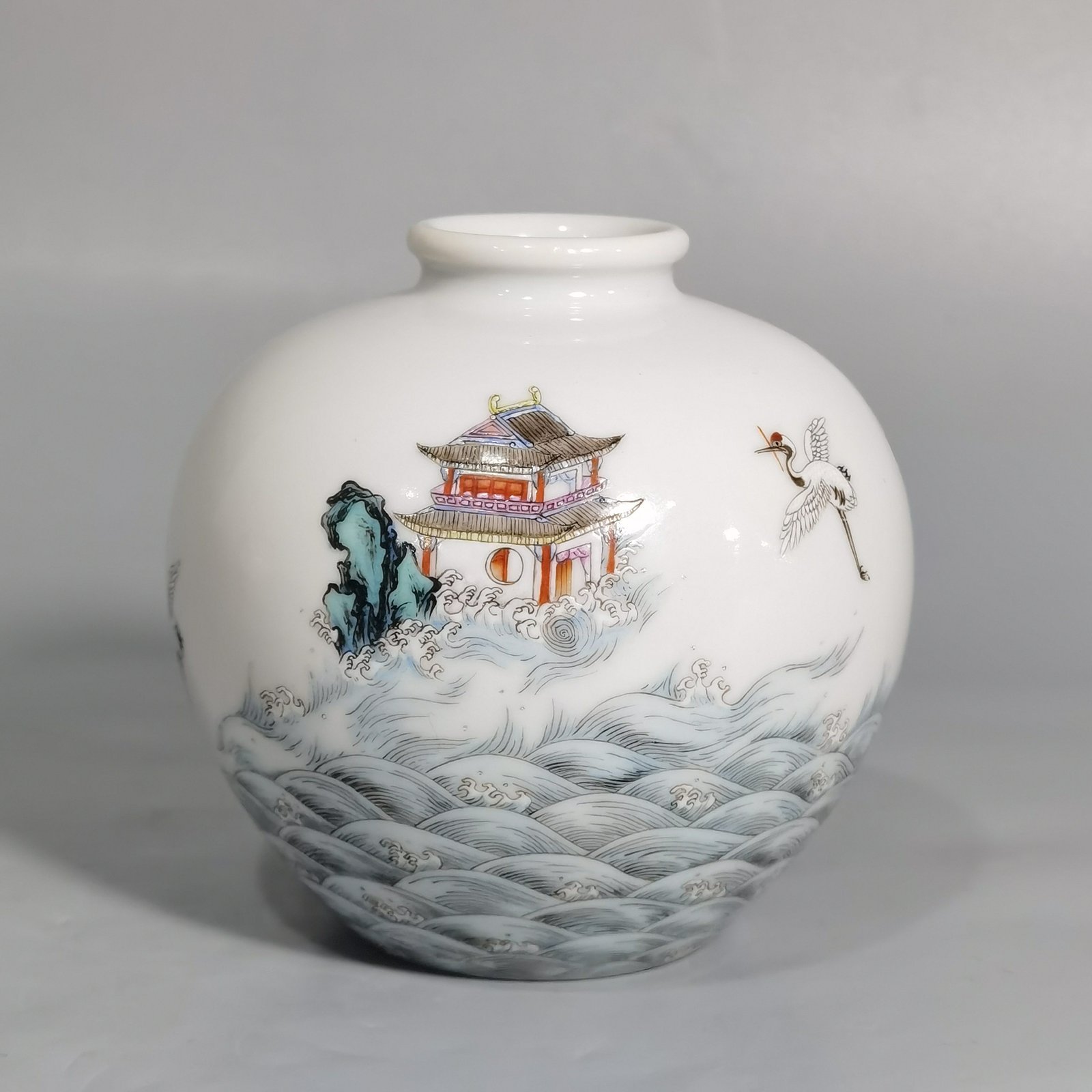 Qing Dynasty Yongzheng a famille rose sea house with a pomegranate statue