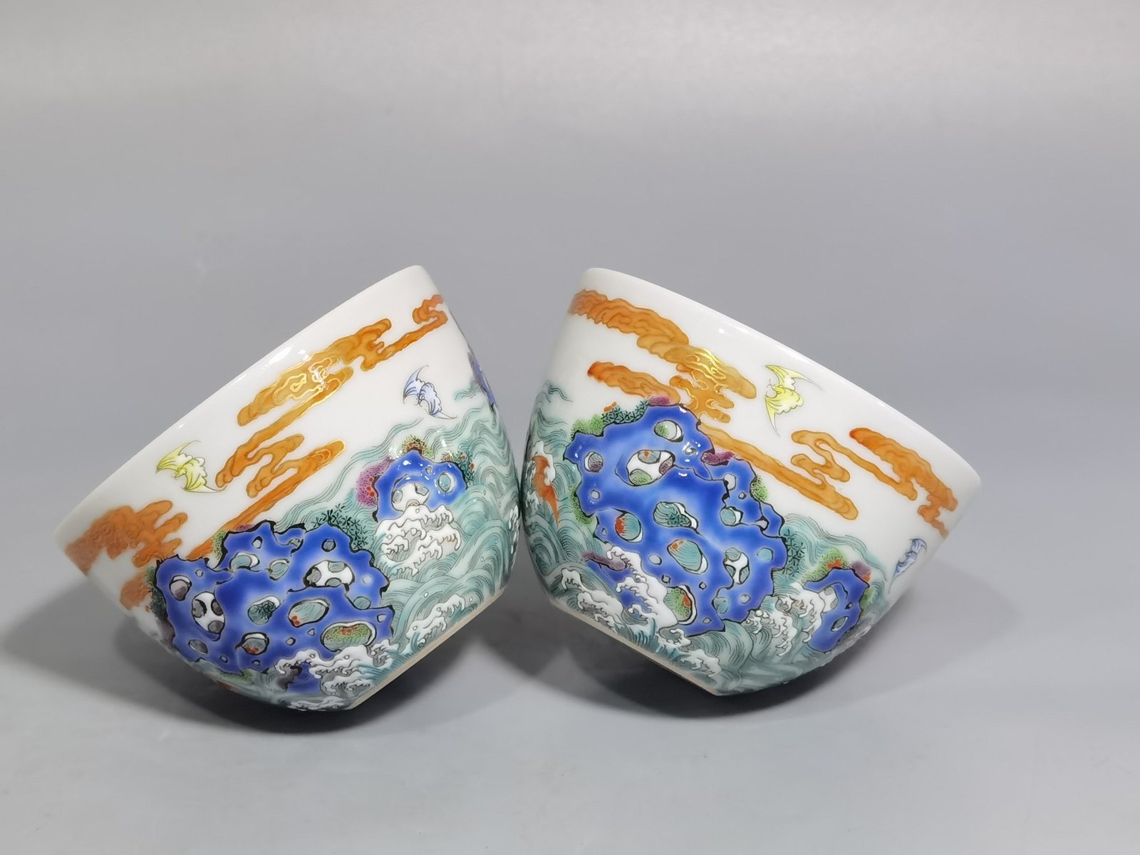 Qing Dynasty Yongzheng Pastel paintings of Fushan and Longevity. Pair of cups