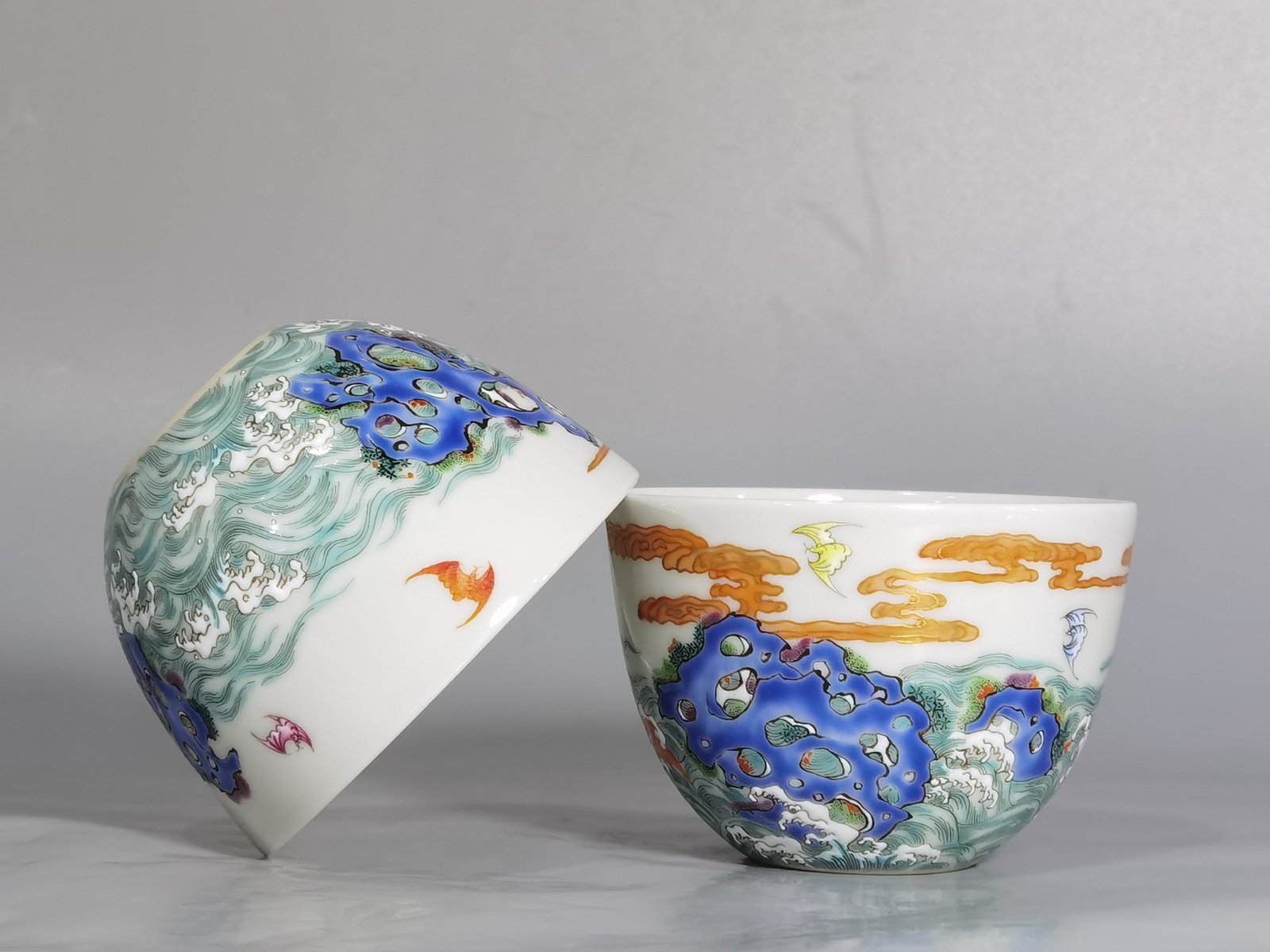 Qing Dynasty Yongzheng Pastel paintings of Fushan and Longevity. Pair of cups