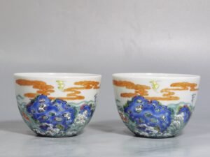 Qing Dynasty Yongzheng Pastel paintings of Fushan and Longevity. Pair of cups