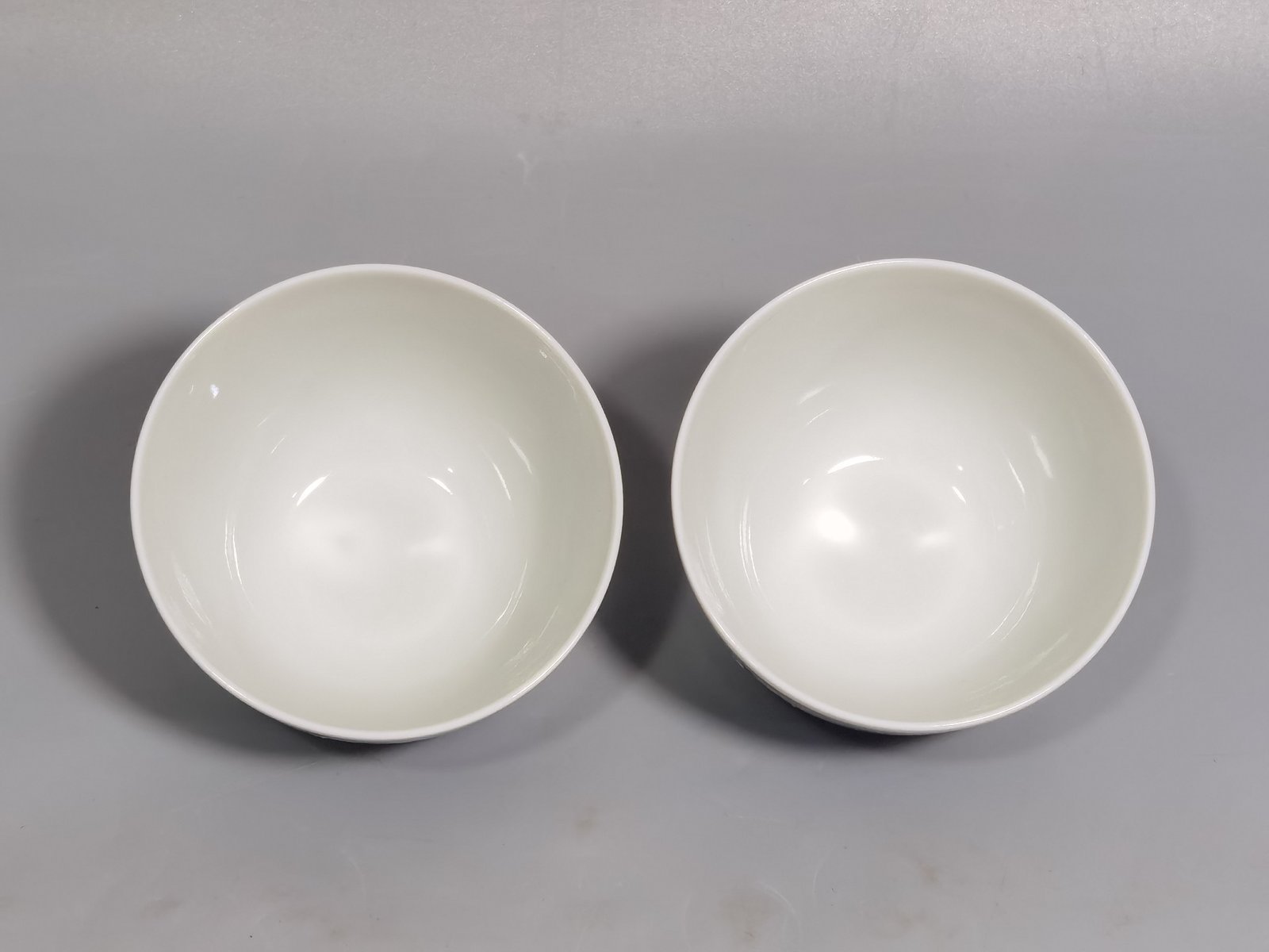 Qing Dynasty Yongzheng Pastel paintings of Fushan and Longevity. Pair of cups
