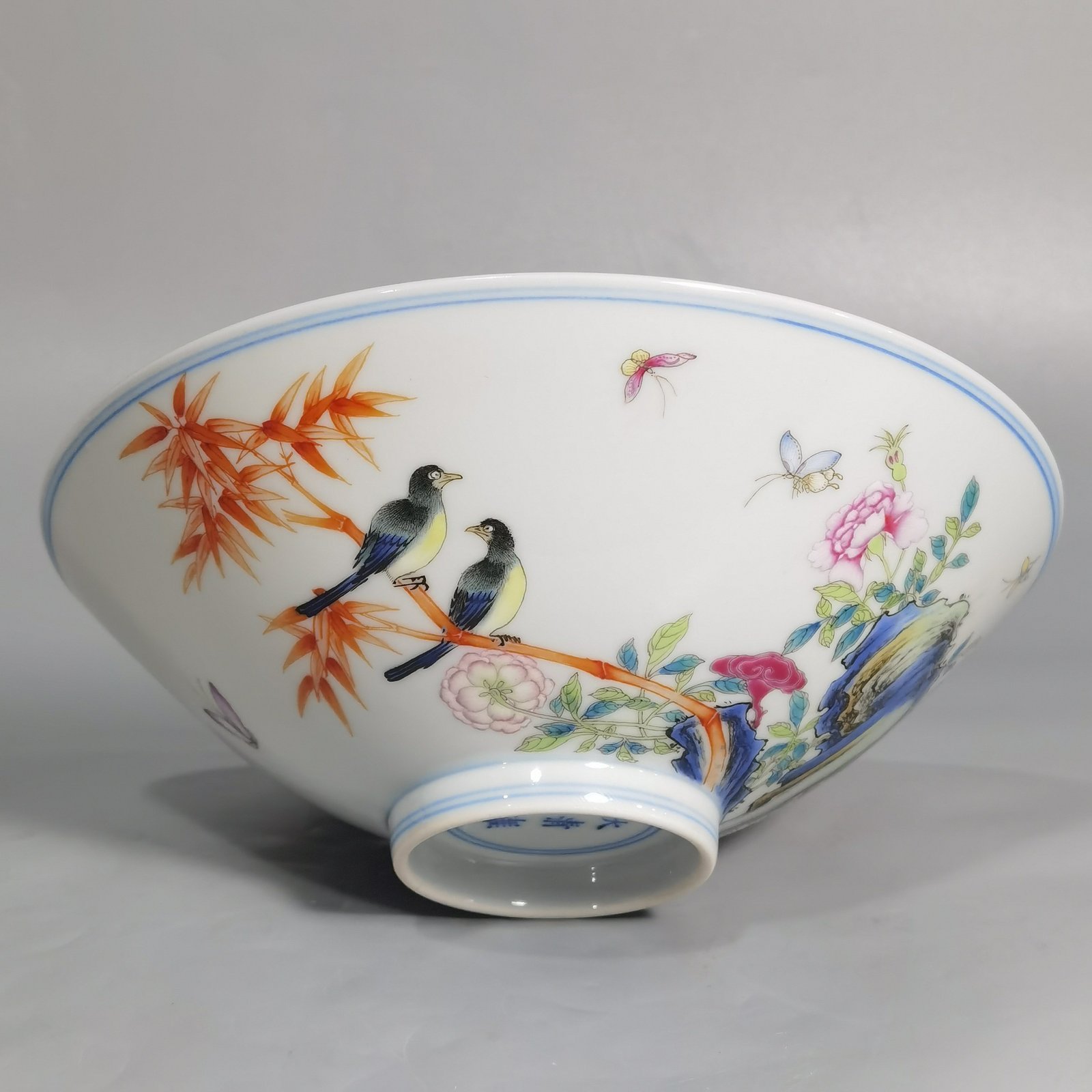 Qing Dynasty Yongzheng a famille rose flower-and-bird hat bowl with three fruits inside